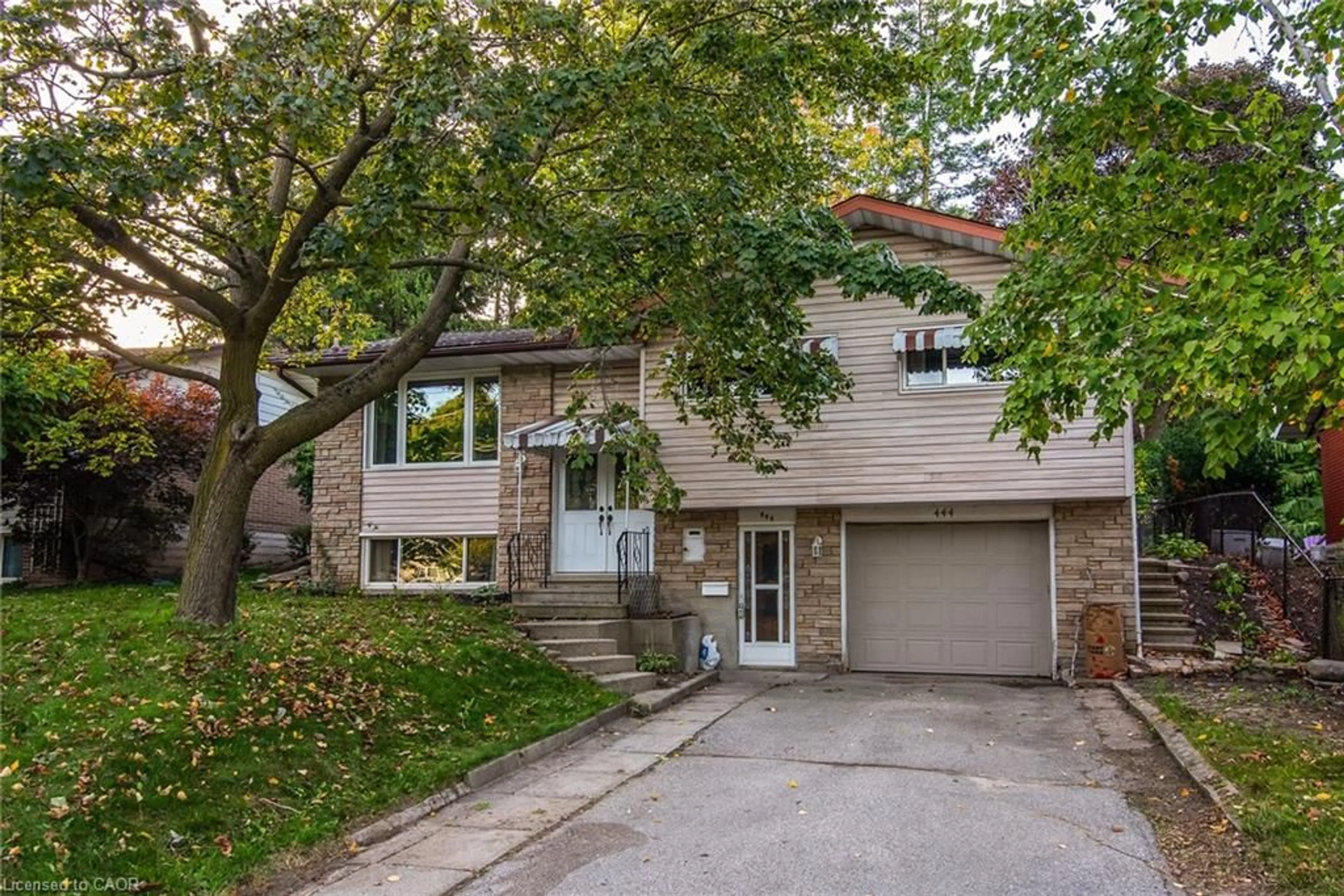 Home with brick exterior material, street for 444 Greenbrook Dr, Kitchener Ontario N2M 4K4