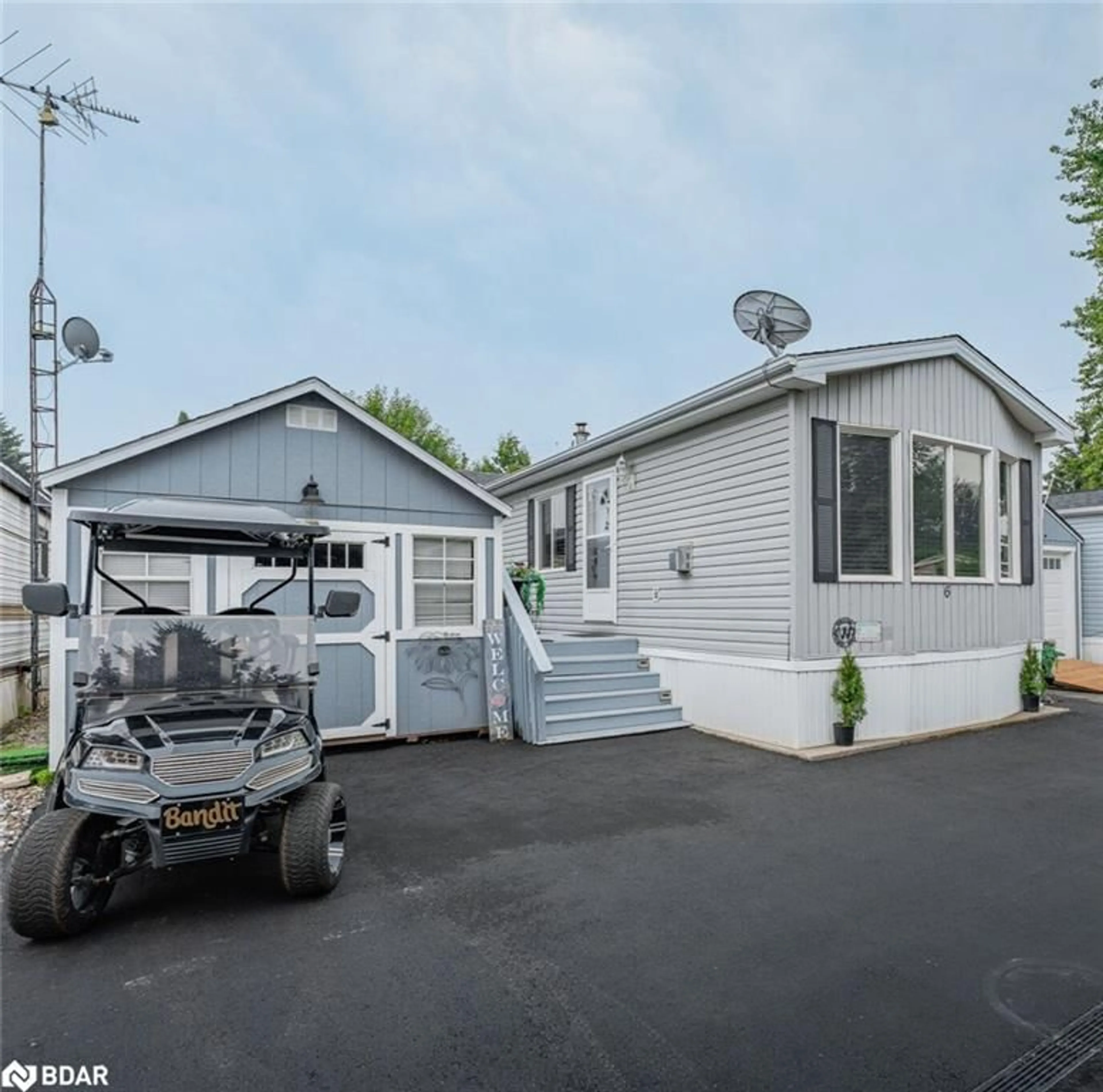 Home with vinyl exterior material, street for 6 Water Street Pvt, Puslinch Ontario N1H 6H9