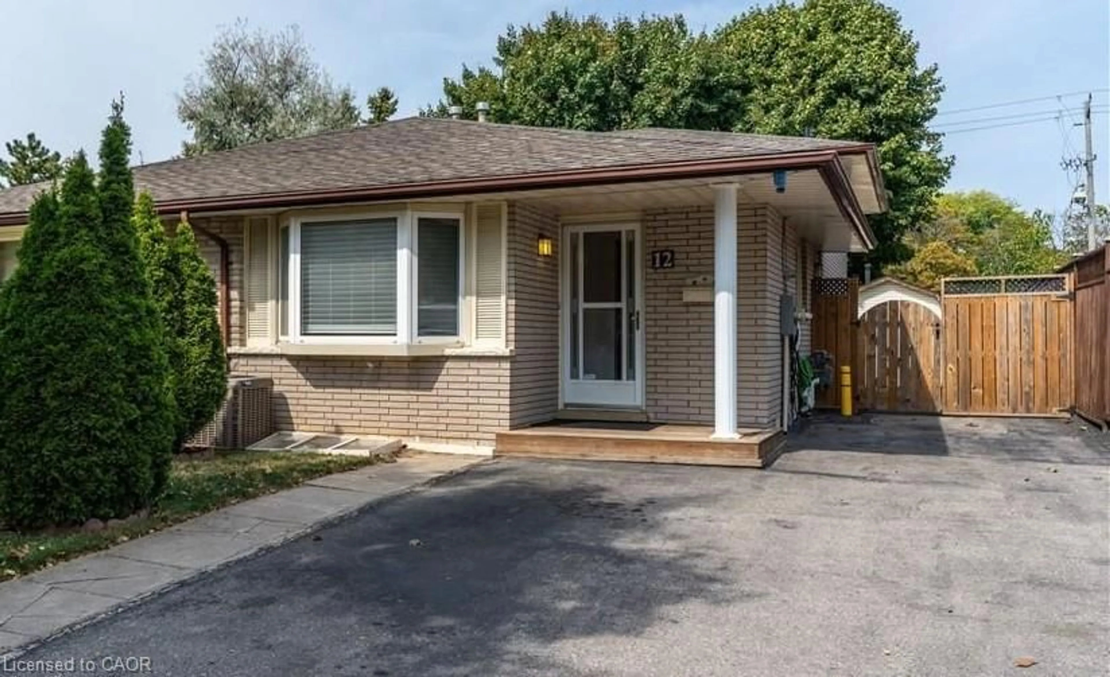 Home with brick exterior material, street for 12 Shea Cres, Kitchener Ontario N2E 1E8