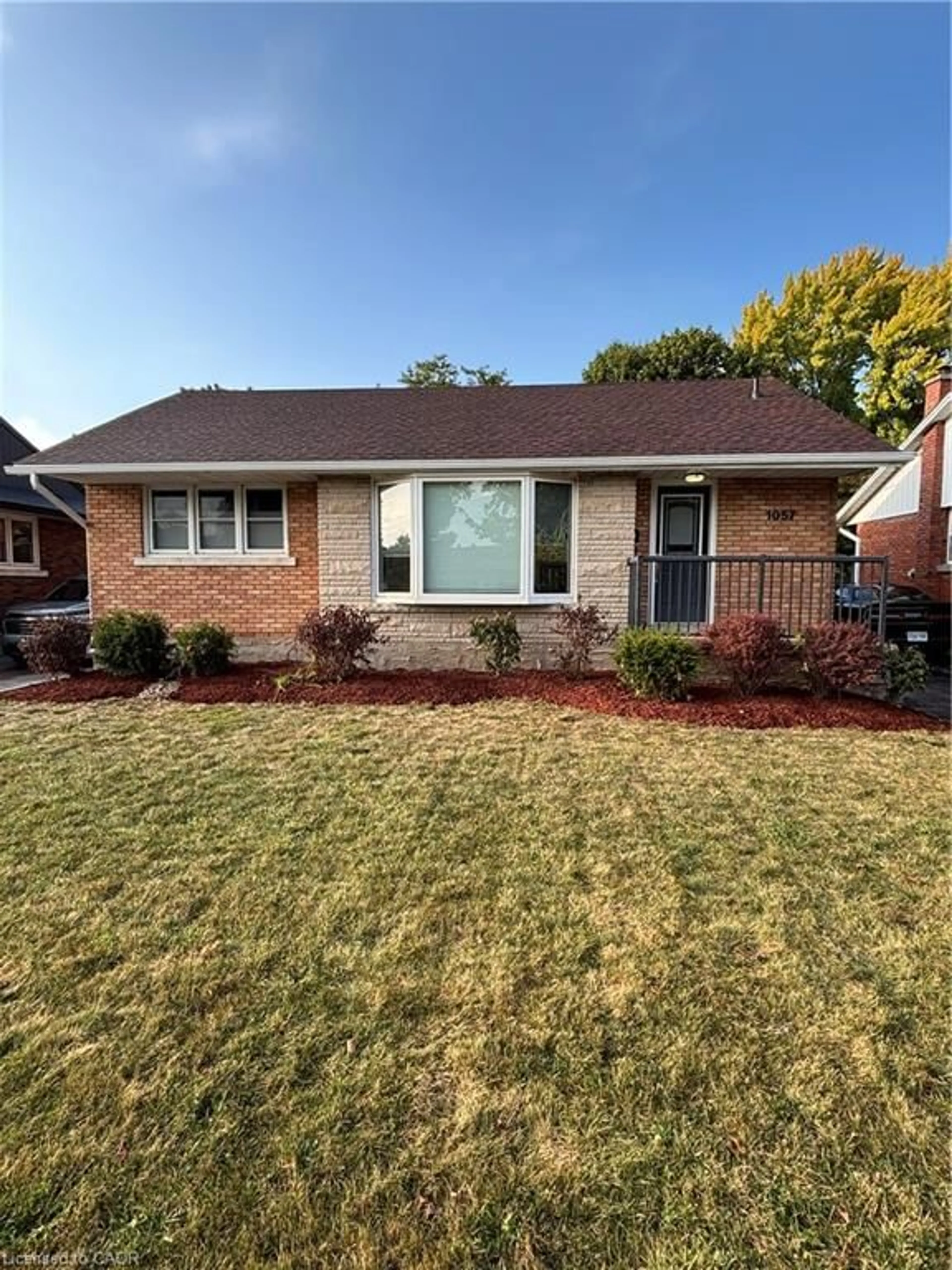 Home with brick exterior material, street for 1057 Clare Ave, Cambridge Ontario N3H 2E2