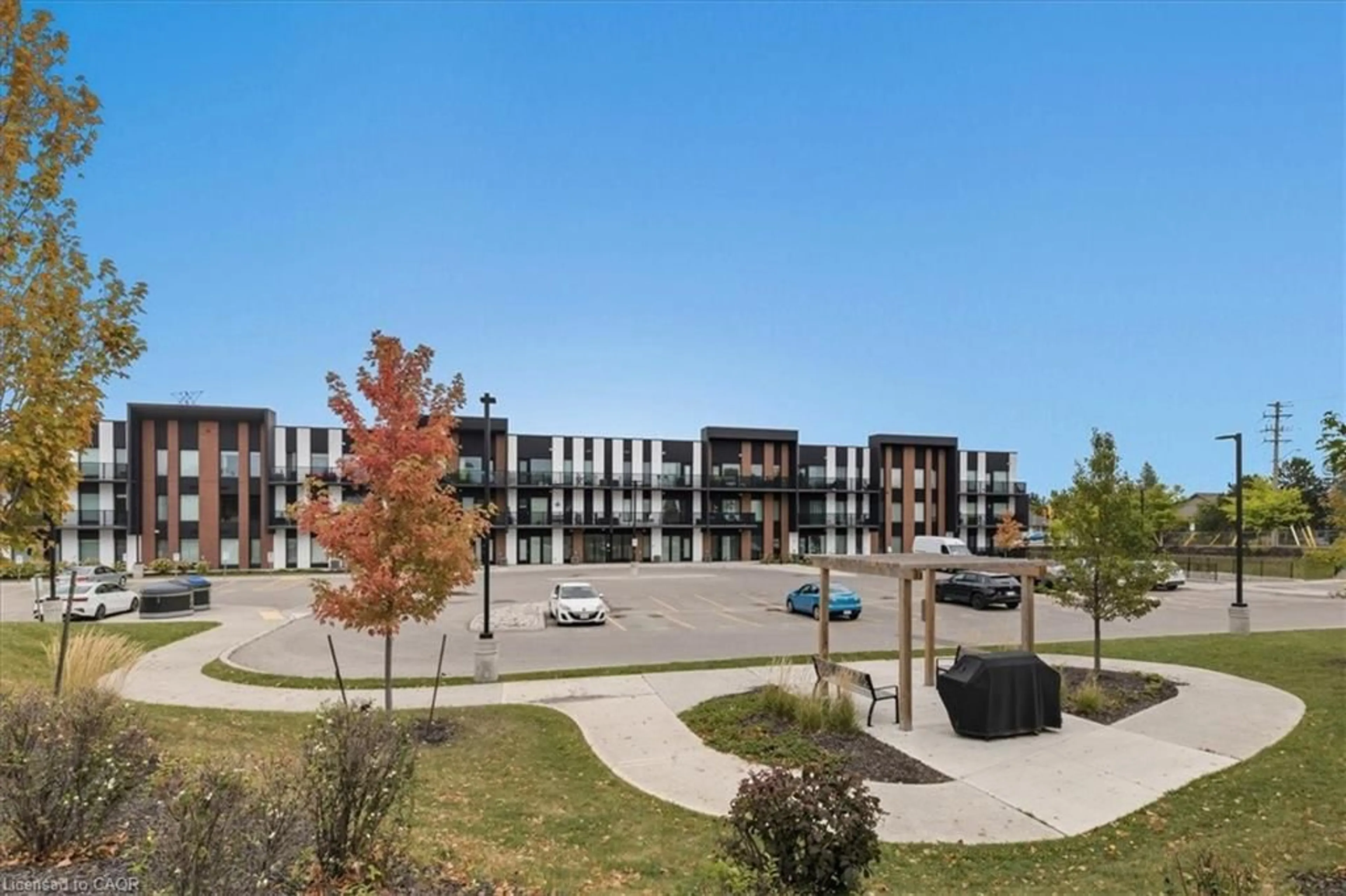 A pic from outside/outdoor area/front of a property/back of a property/a pic from drone, unknown for 5 Wake Robin Dr #304, Kitchener Ontario N2E 0H6