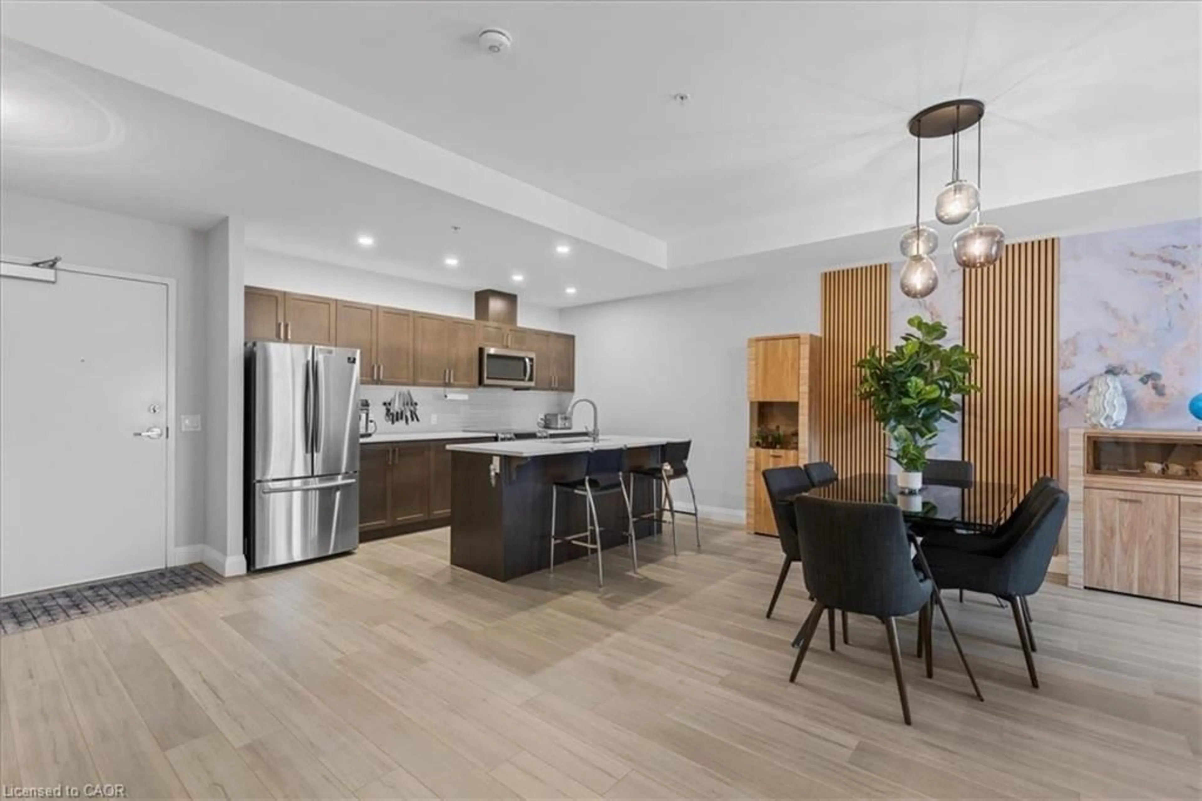 Open concept kitchen, wood/laminate floor for 5 Wake Robin Dr #304, Kitchener Ontario N2E 0H6