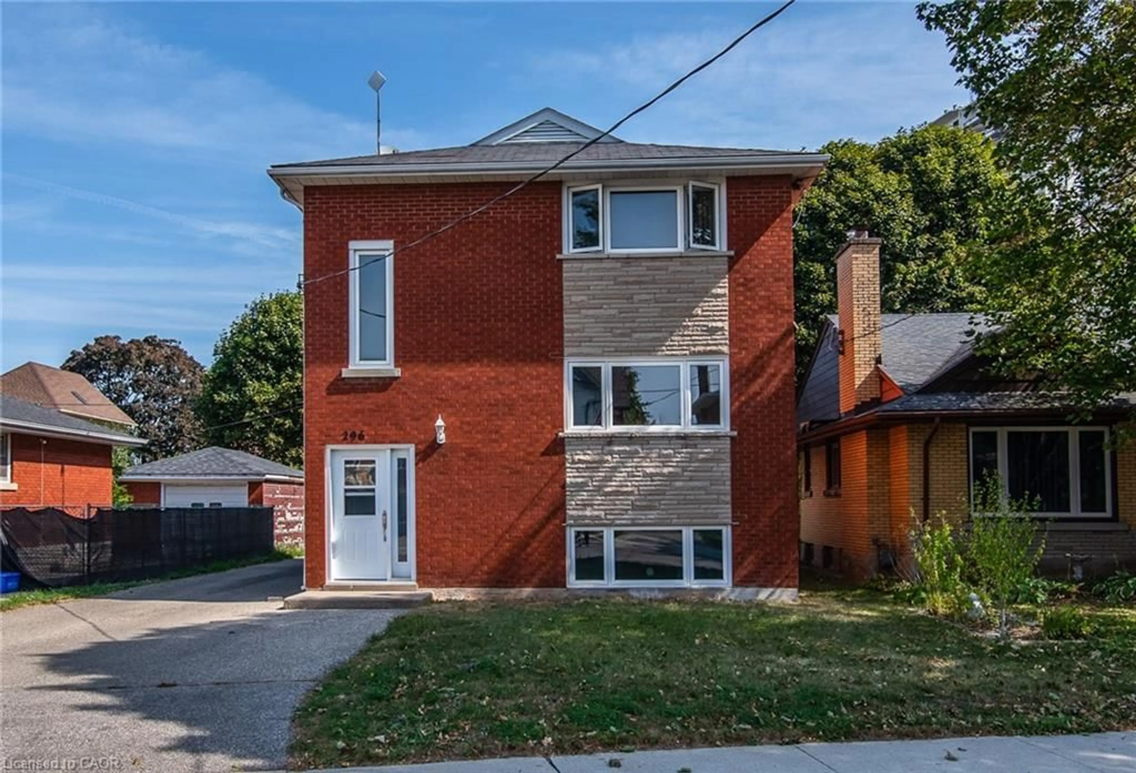 Home with brick exterior material, street for 296 Ahrens St, Kitchener Ontario N2H 4E4
