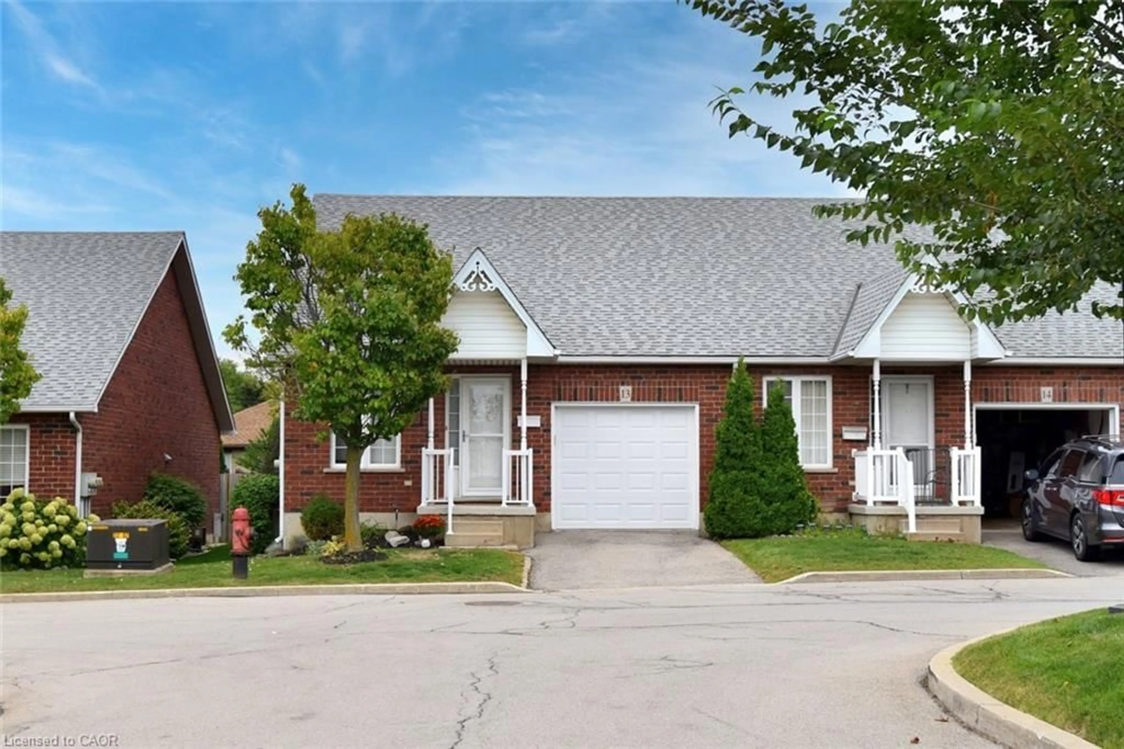 Home with brick exterior material, street for 243 Fennell Ave #13, Hamilton Ontario L9A 1S8