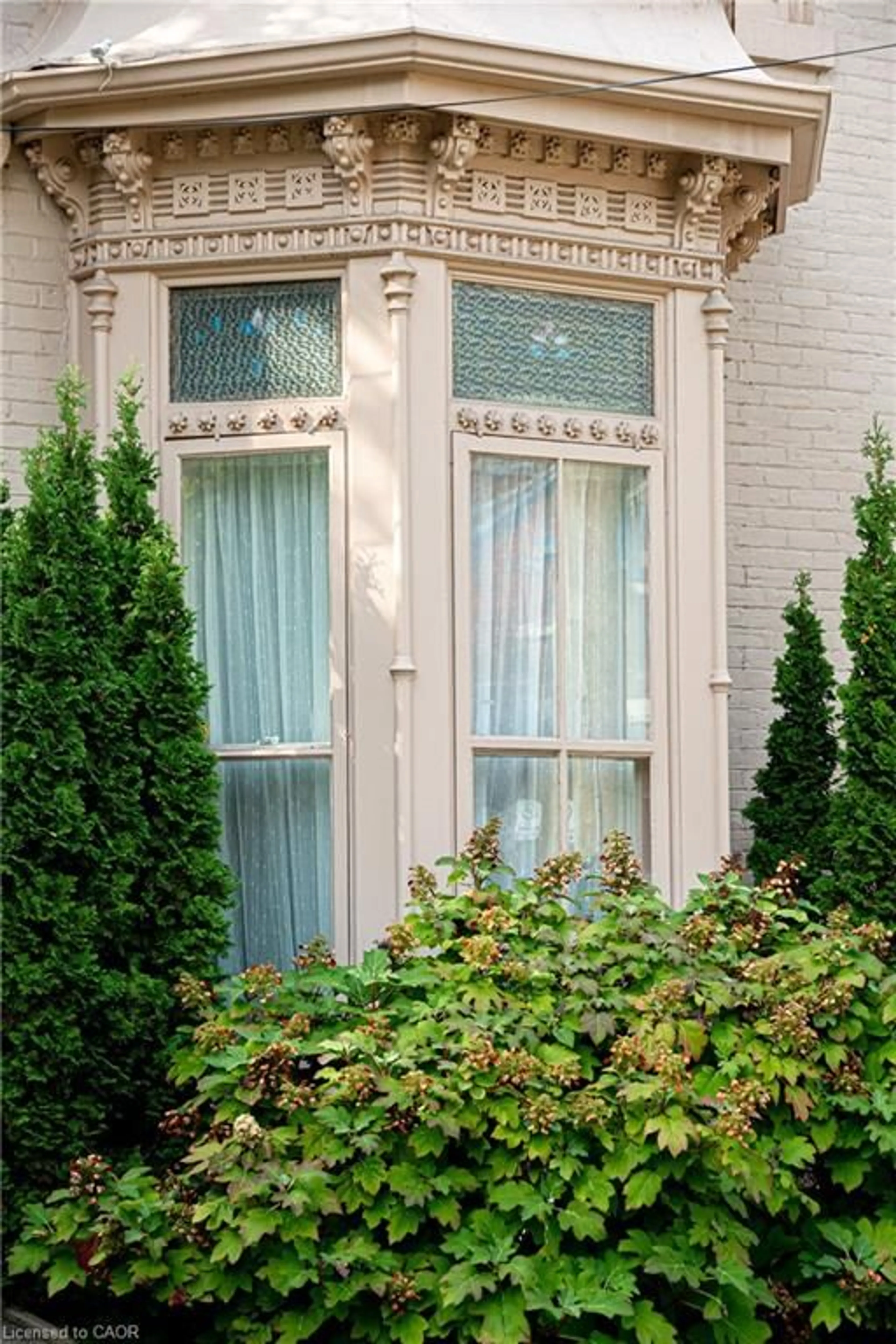 Home with brick exterior material, street for 218 Bay St, Hamilton Ontario L8P 3J1