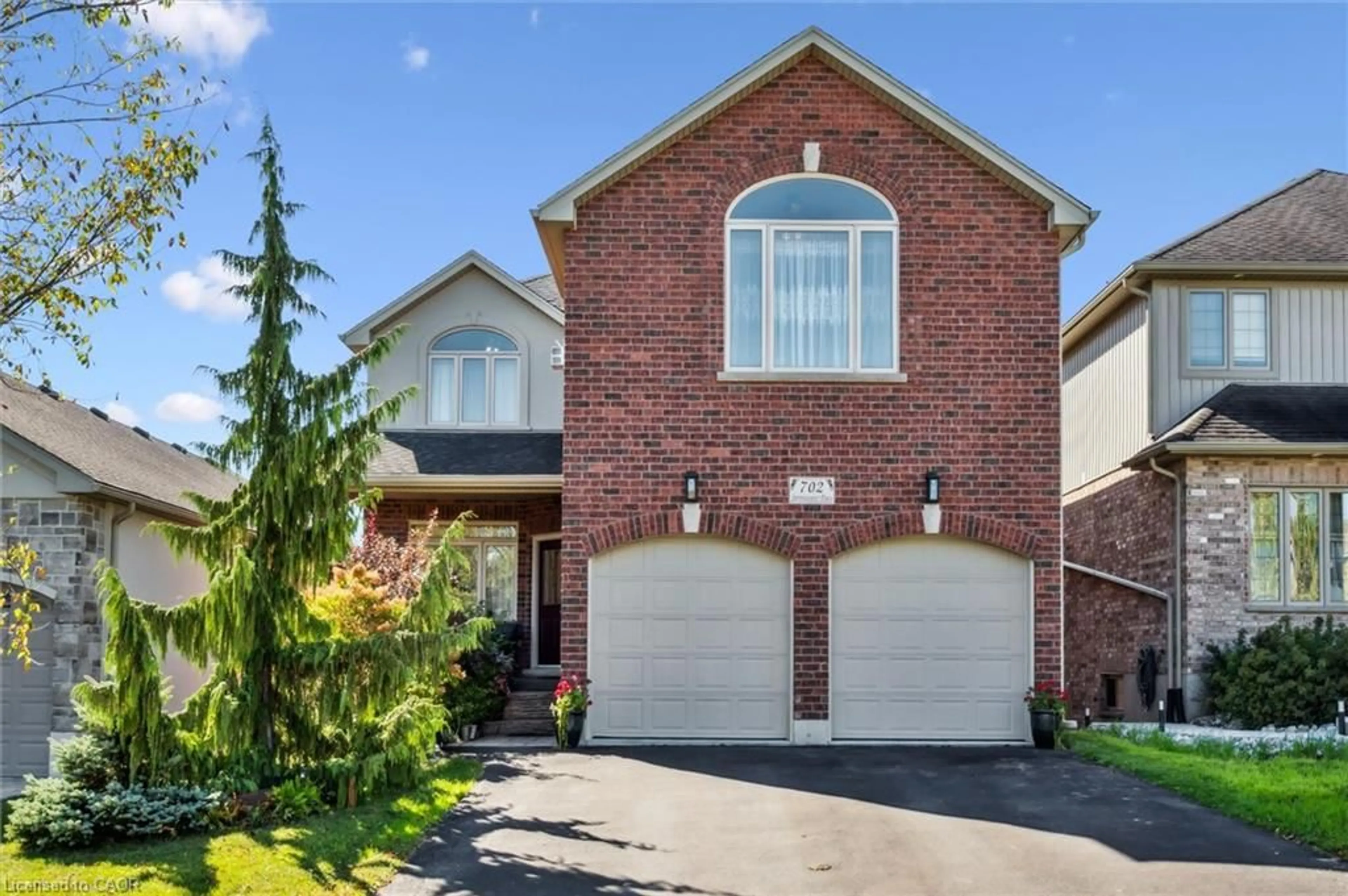 Home with brick exterior material, street for 702 Springwater Pl, Waterloo Ontario N2V 2S5