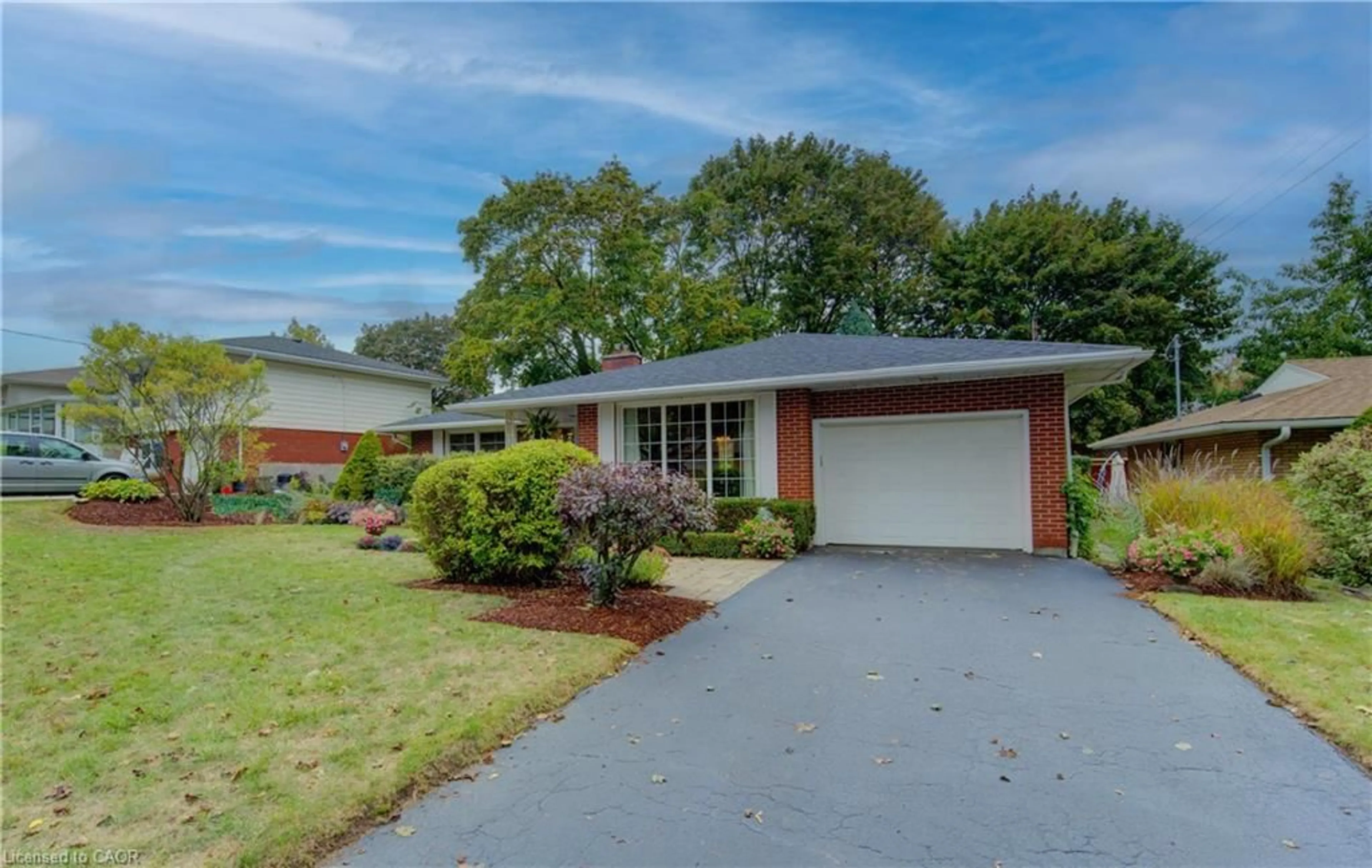 Home with brick exterior material, street for 50 Gatewood Rd, Kitchener Ontario N2M 4E4