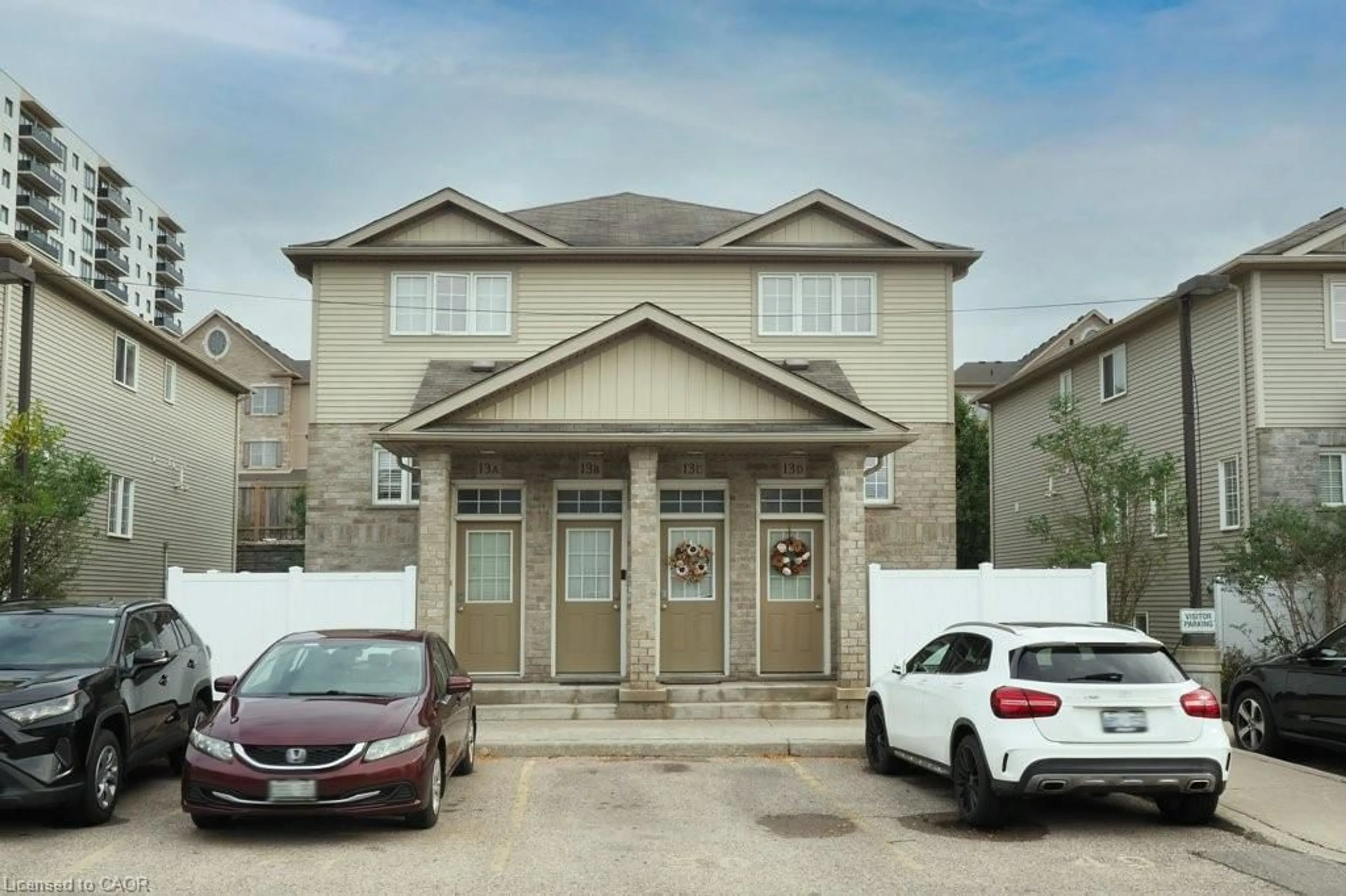 A pic from outside/outdoor area/front of a property/back of a property/a pic from drone, unknown for 240 Westmeadow Dr #D13, Kitchener Ontario N2N 0A1