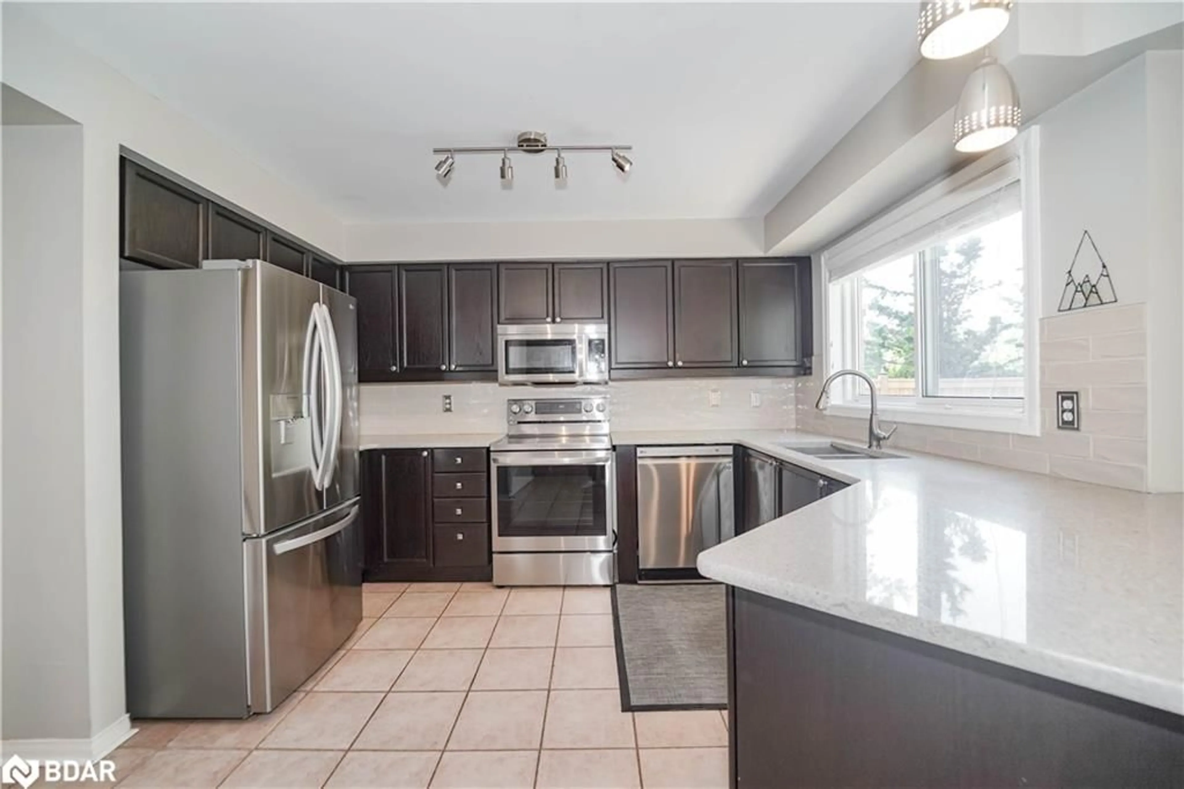 Open concept kitchen, ceramic/tile floor for 50 Gartshore Dr, Whitby Ontario L1P 1N6