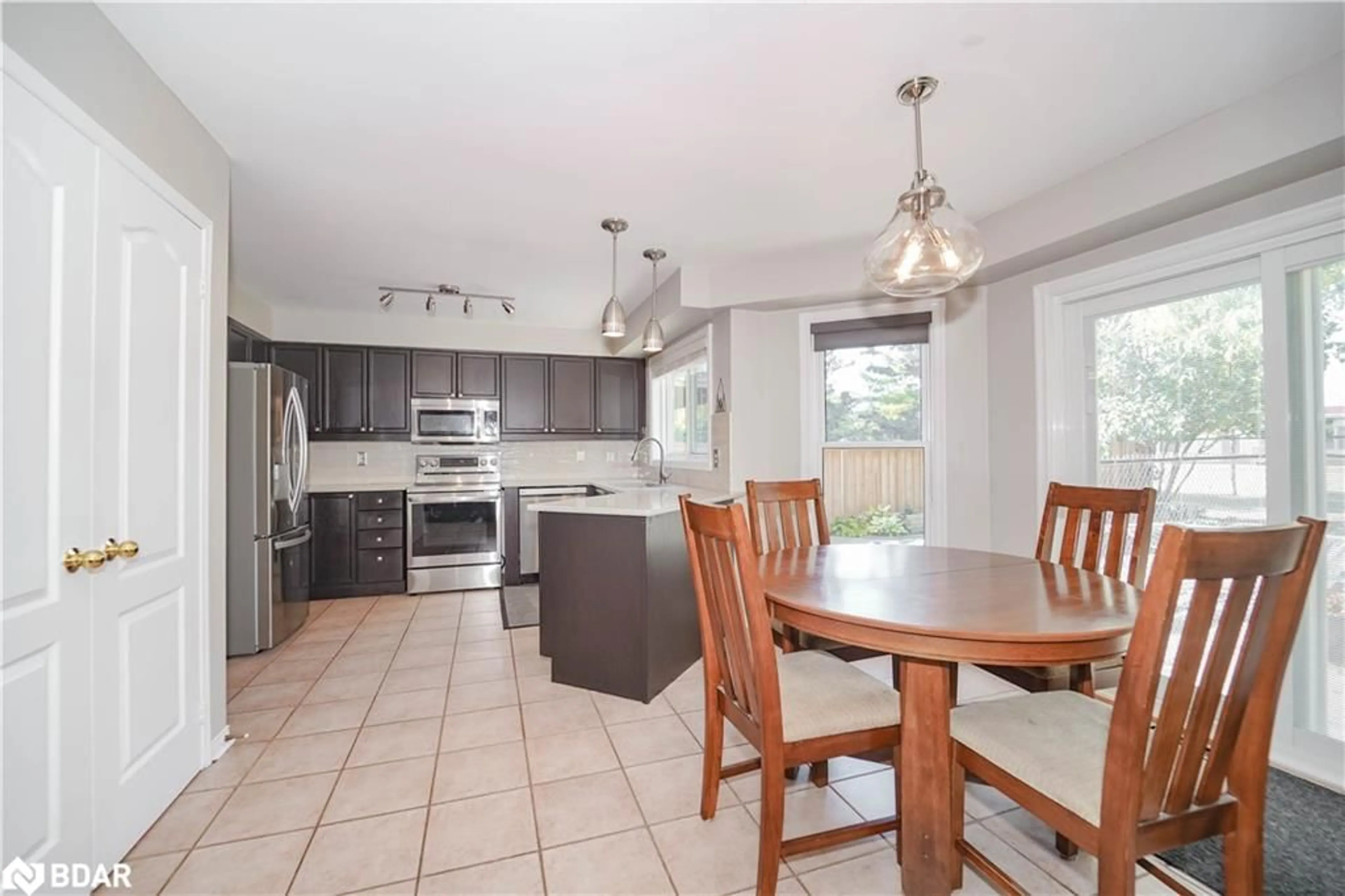 Open concept kitchen, ceramic/tile floor for 50 Gartshore Dr, Whitby Ontario L1P 1N6