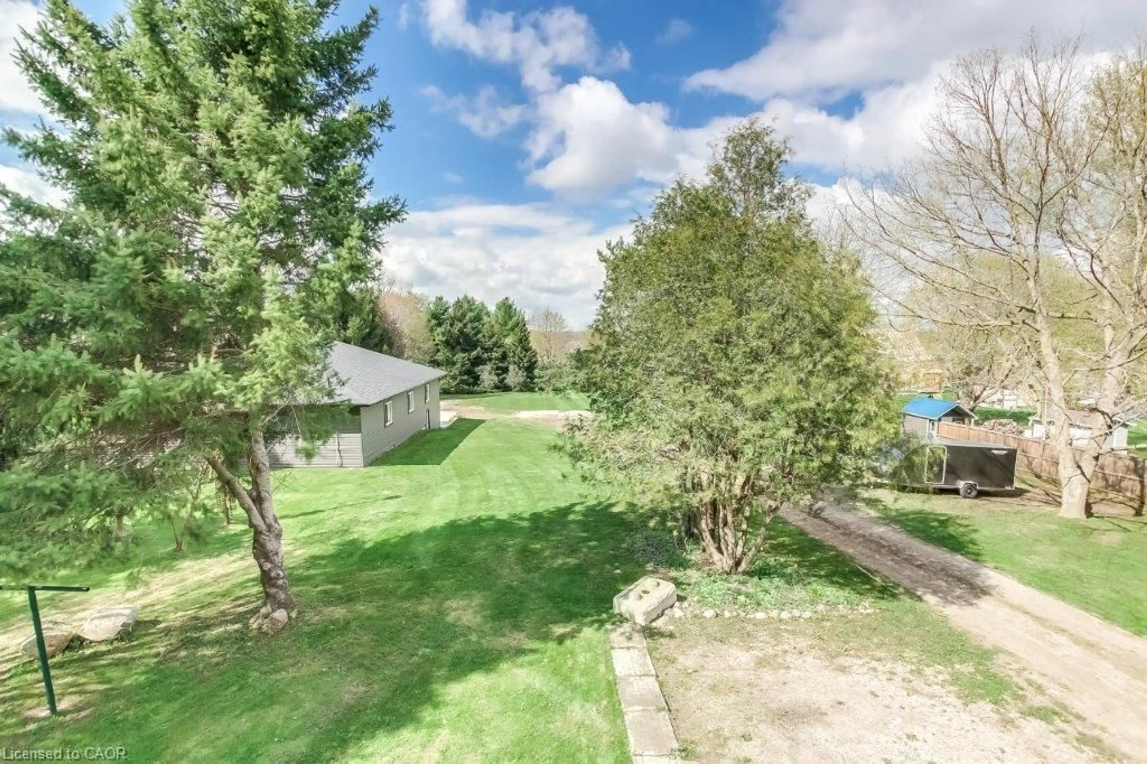 A pic from outside/outdoor area/front of a property/back of a property/a pic from drone, forest/trees view for 3697 Lobsinger Line, St. Clements Ontario N0B 2M0