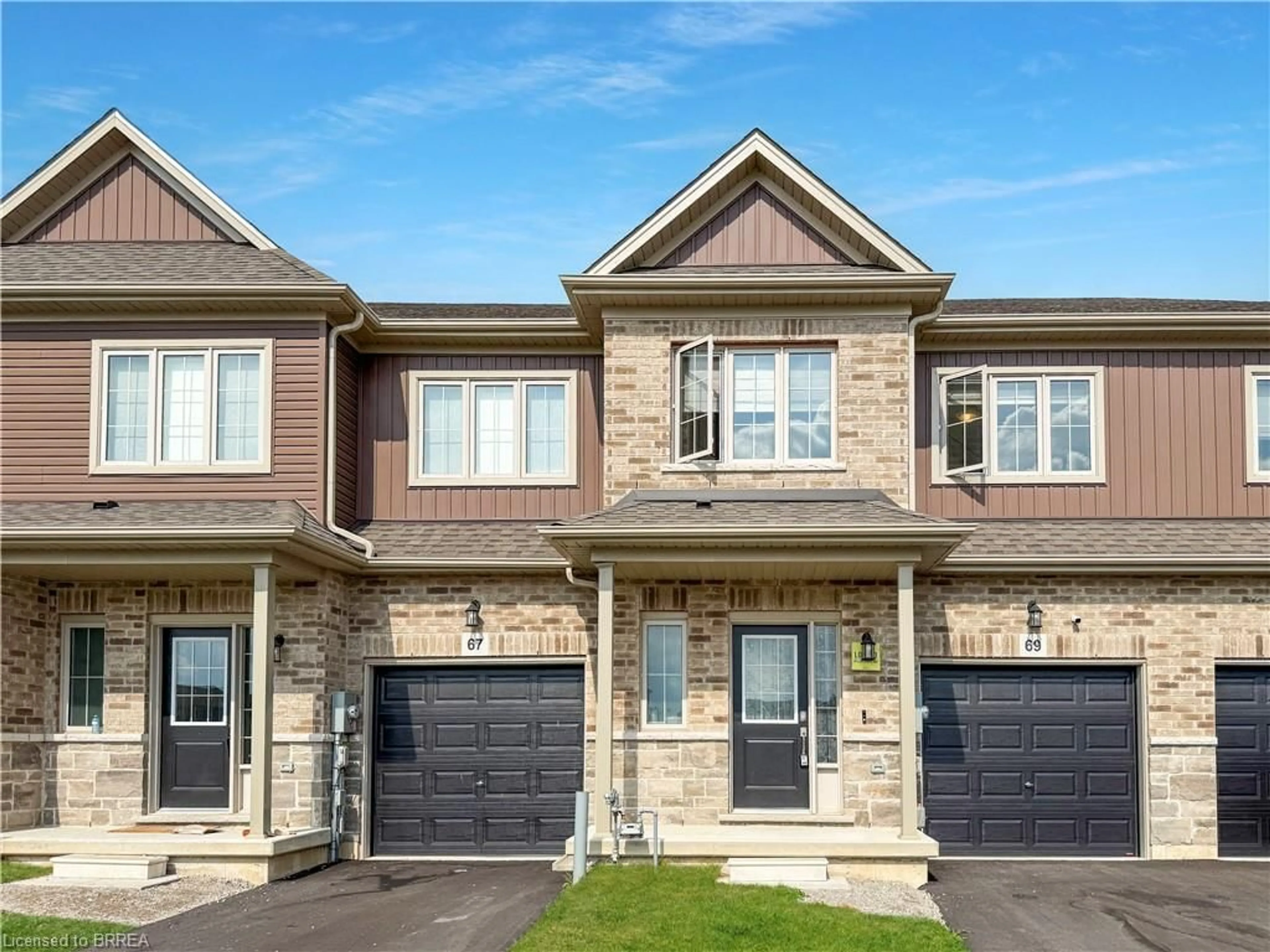 Home with brick exterior material, street for 69 Lloyd Davies Way, Binbrook Ontario L0R 1C0