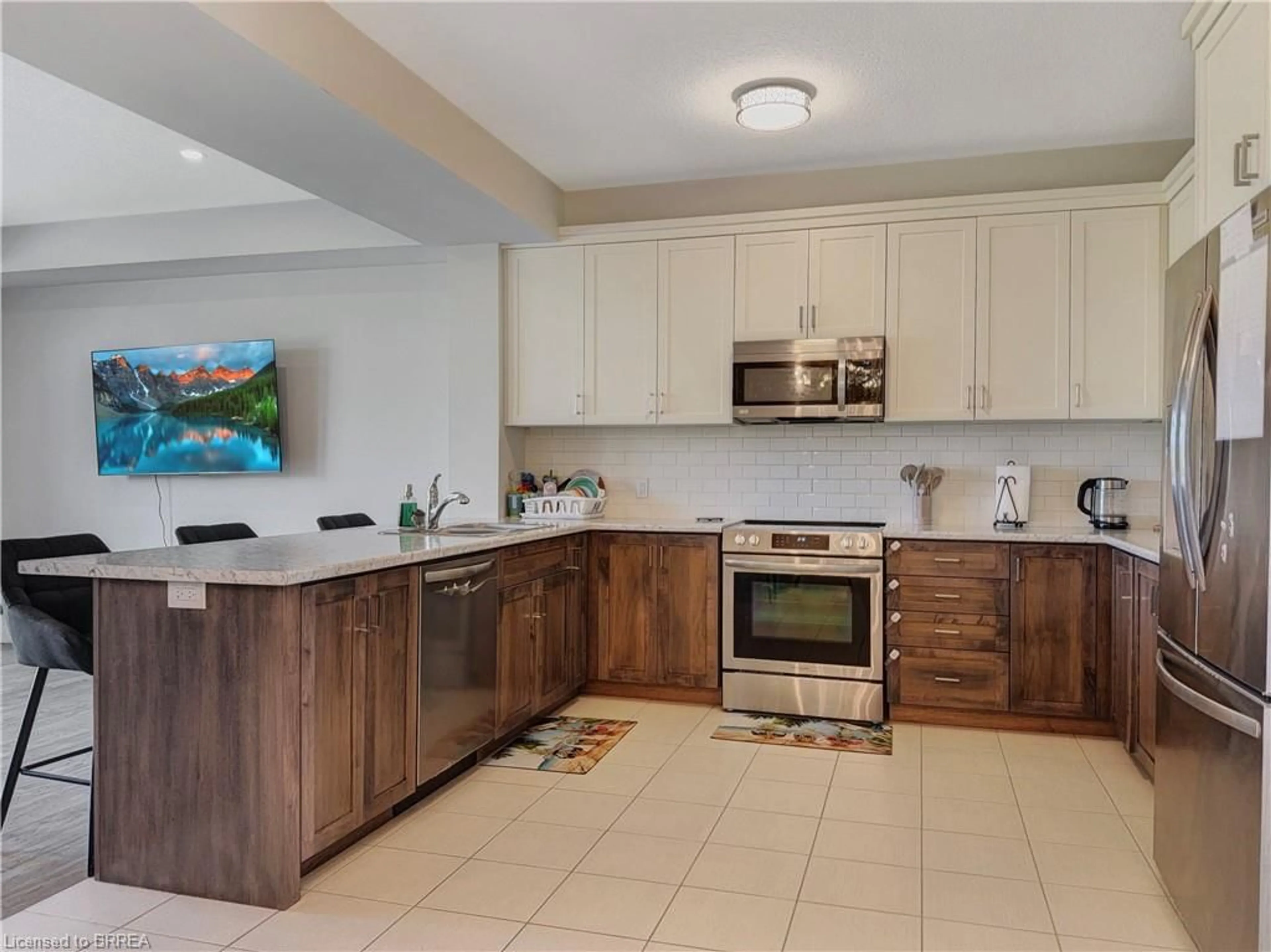 Open concept kitchen, ceramic/tile floor for 69 Lloyd Davies Way, Binbrook Ontario L0R 1C0