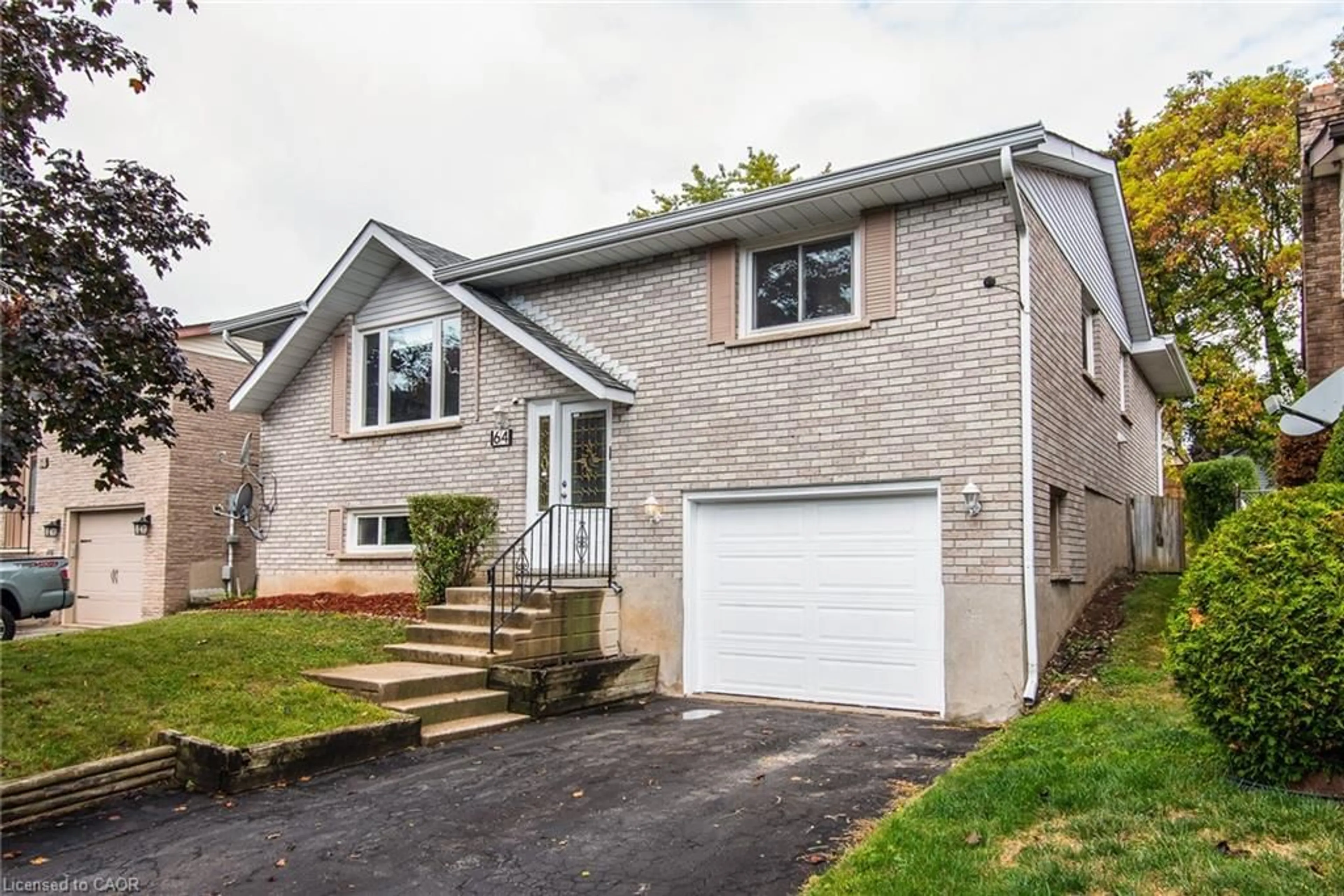 Home with brick exterior material, street for 64 Sabrina Cres, Kitchener Ontario N2P 1Y6