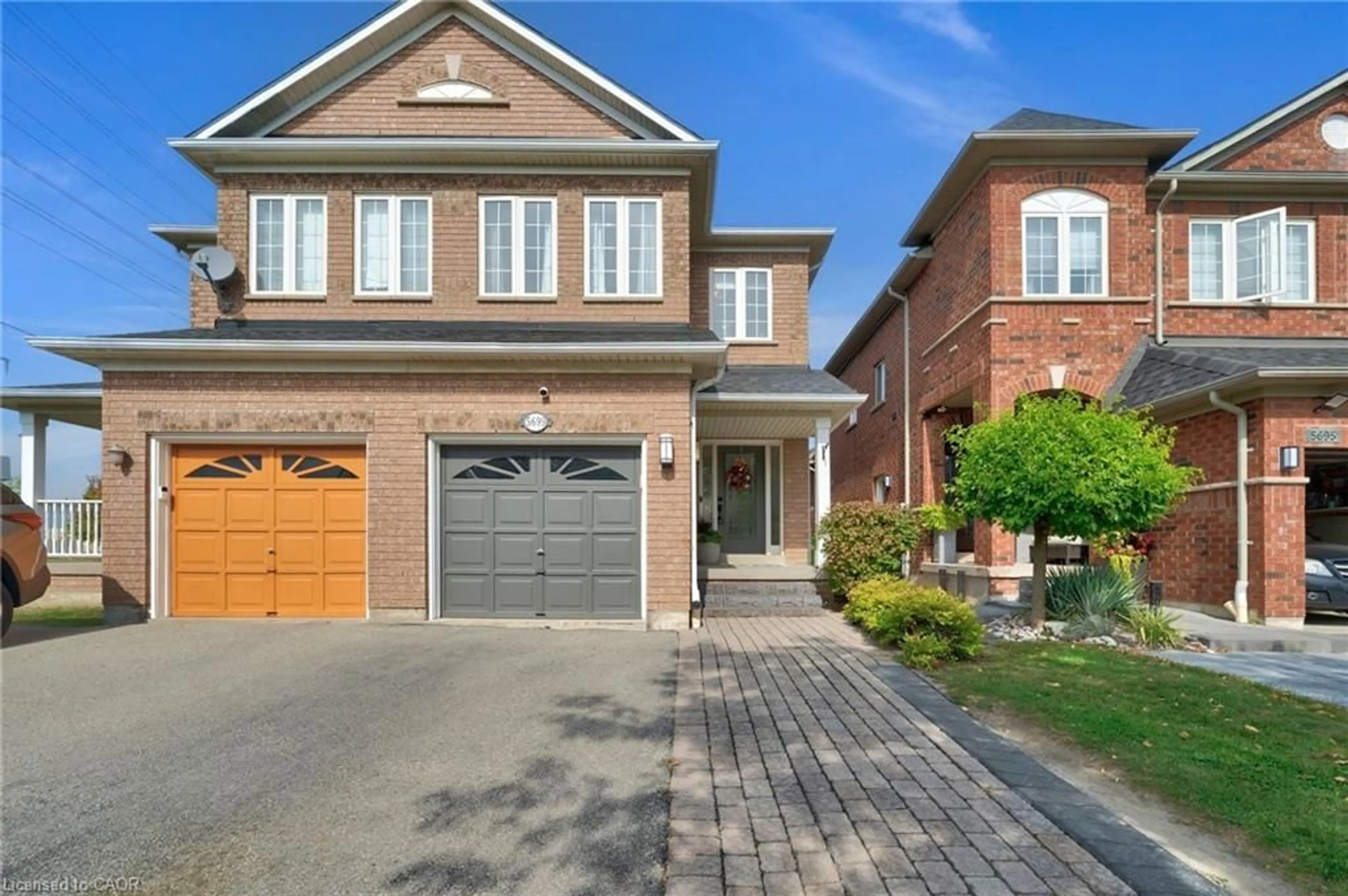 Home with brick exterior material, street for 5699 Raleigh St, Mississauga Ontario L5M 7E6