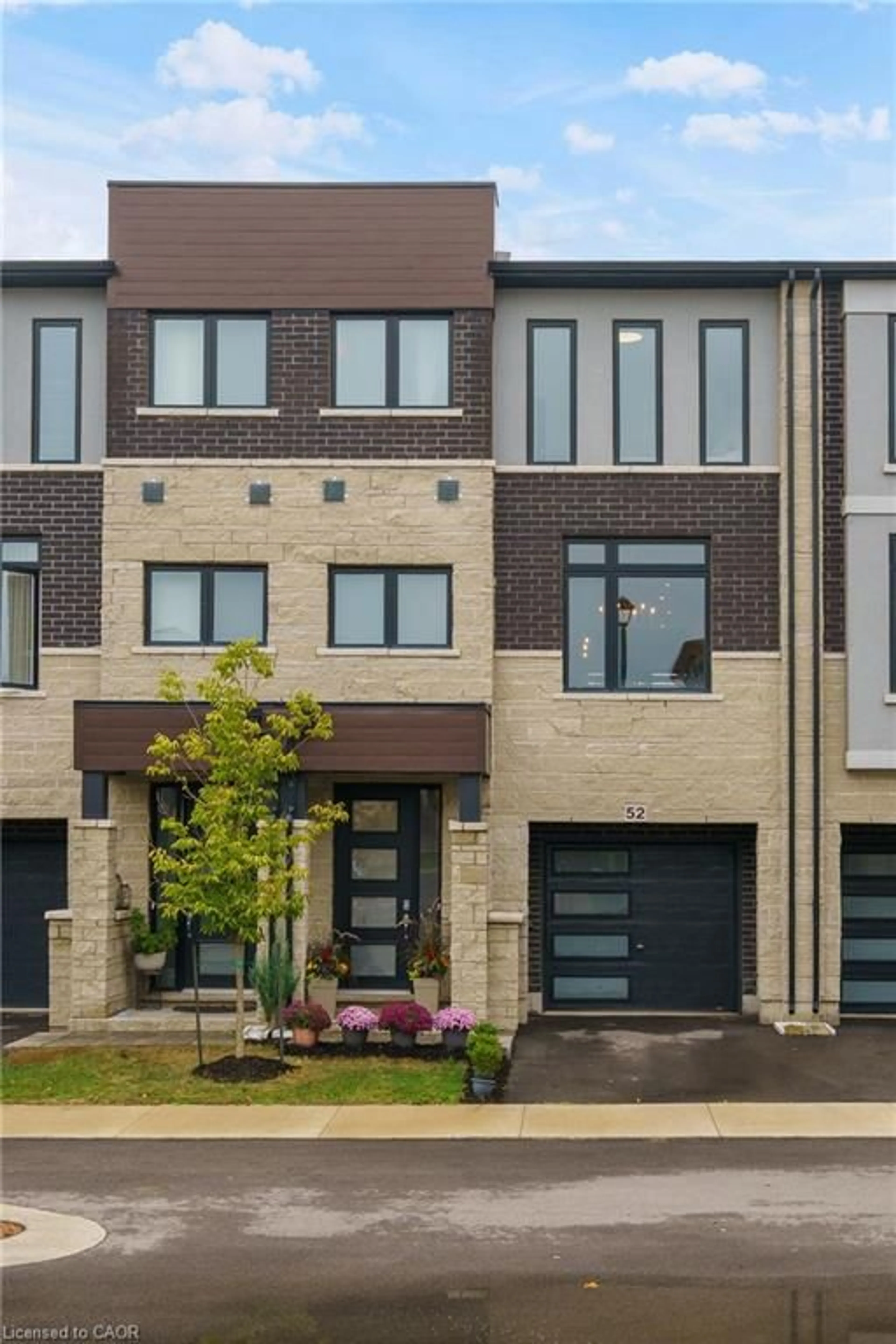 Home with brick exterior material, street for 52 Cadwell Lane, Hamilton Ontario L9C 0E8