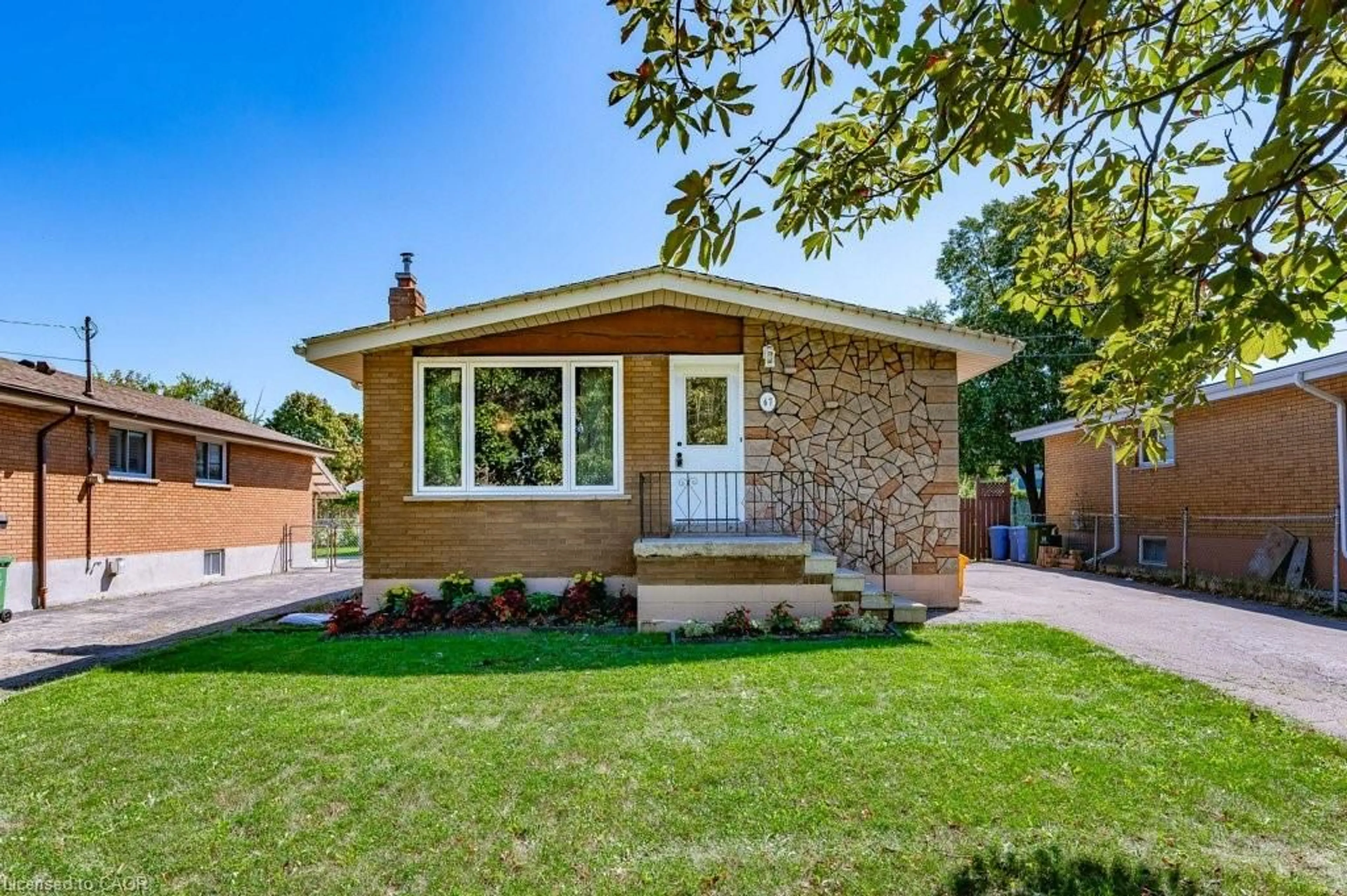 Home with brick exterior material, street for 67 Deschene Ave, Hamilton Ontario L9A 3J8