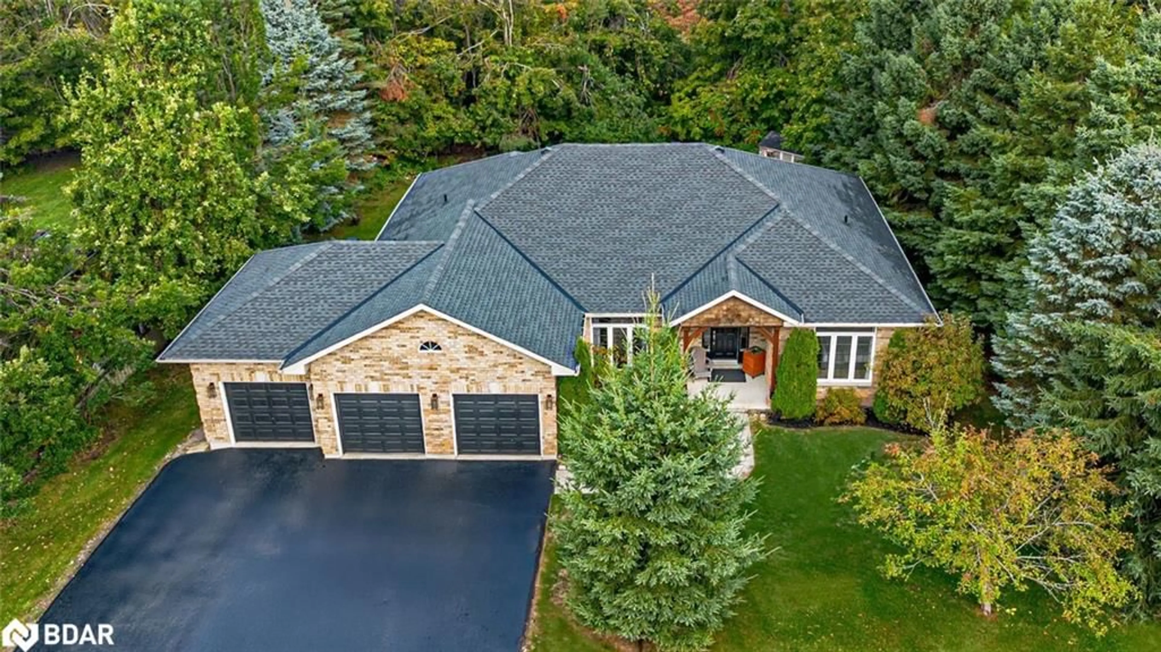 A pic from outside/outdoor area/front of a property/back of a property/a pic from drone, street for 102 Highland Dr, Horseshoe Valley Ontario L0L 2L0