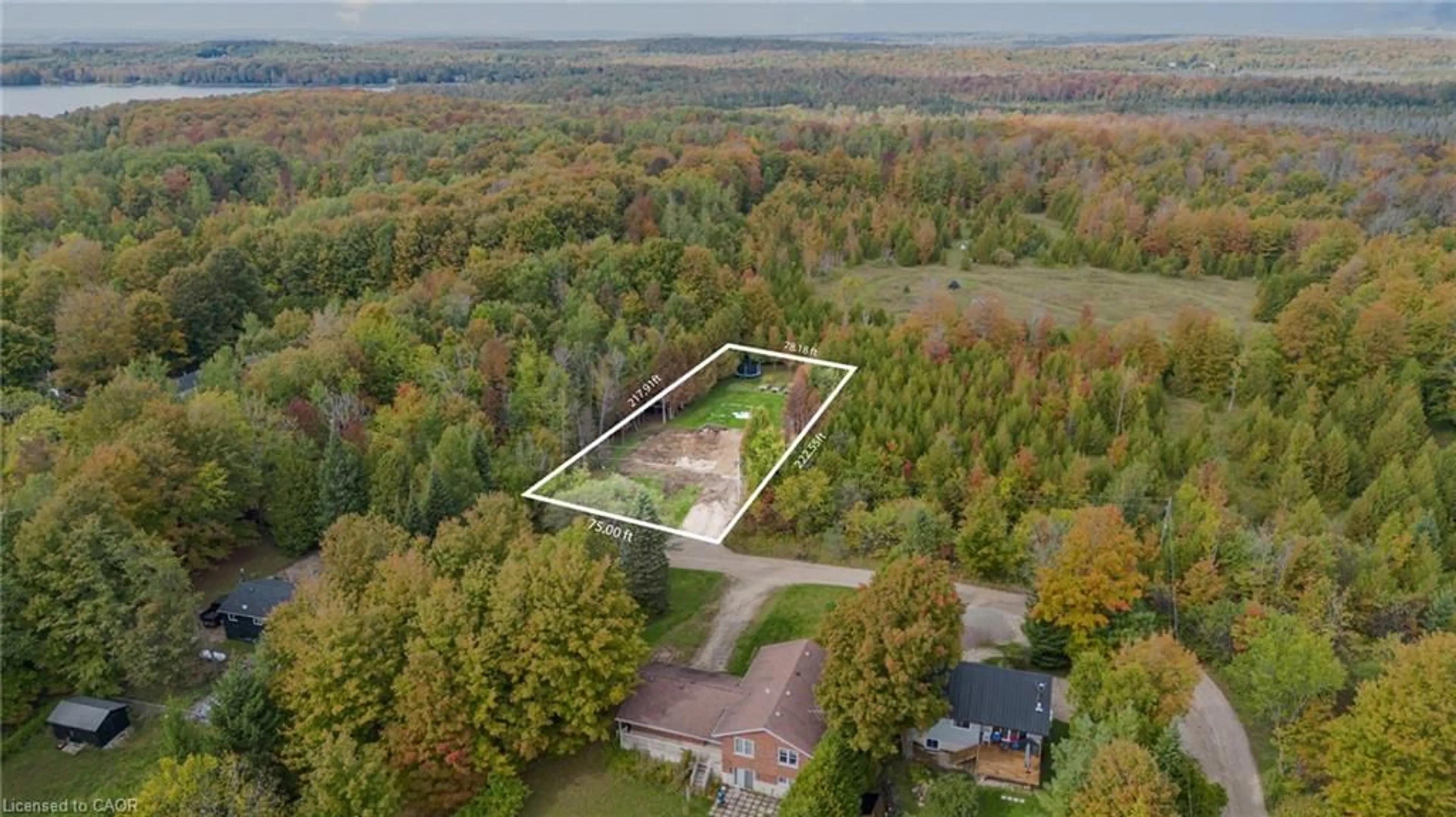 A pic from outside/outdoor area/front of a property/back of a property/a pic from drone, unknown for 135 Sir Williams Lane, Flesherton Ontario N0C 1E0