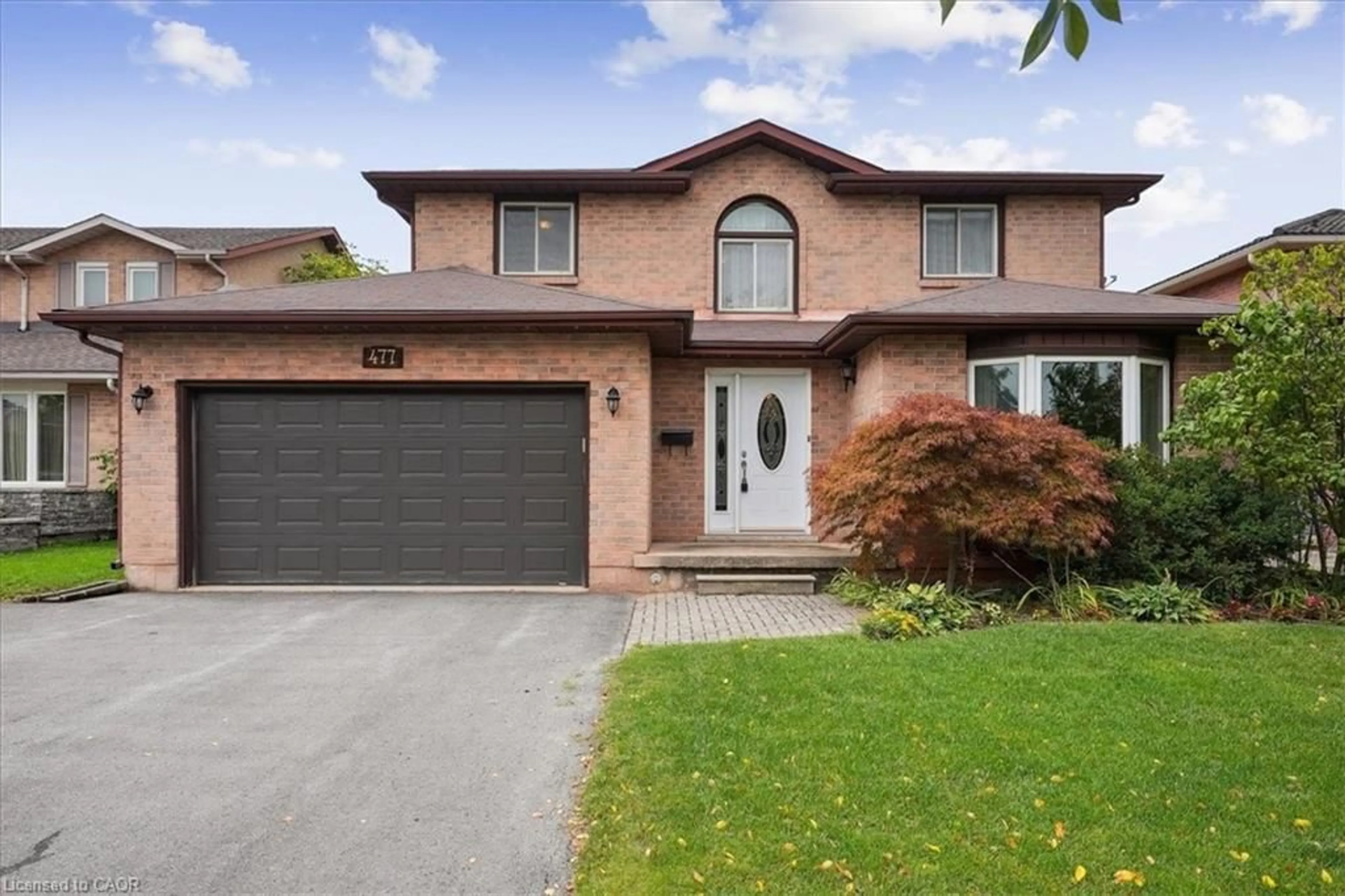 Home with brick exterior material, street for 477 Deerhurst Dr, Burlington Ontario L7L 5T4