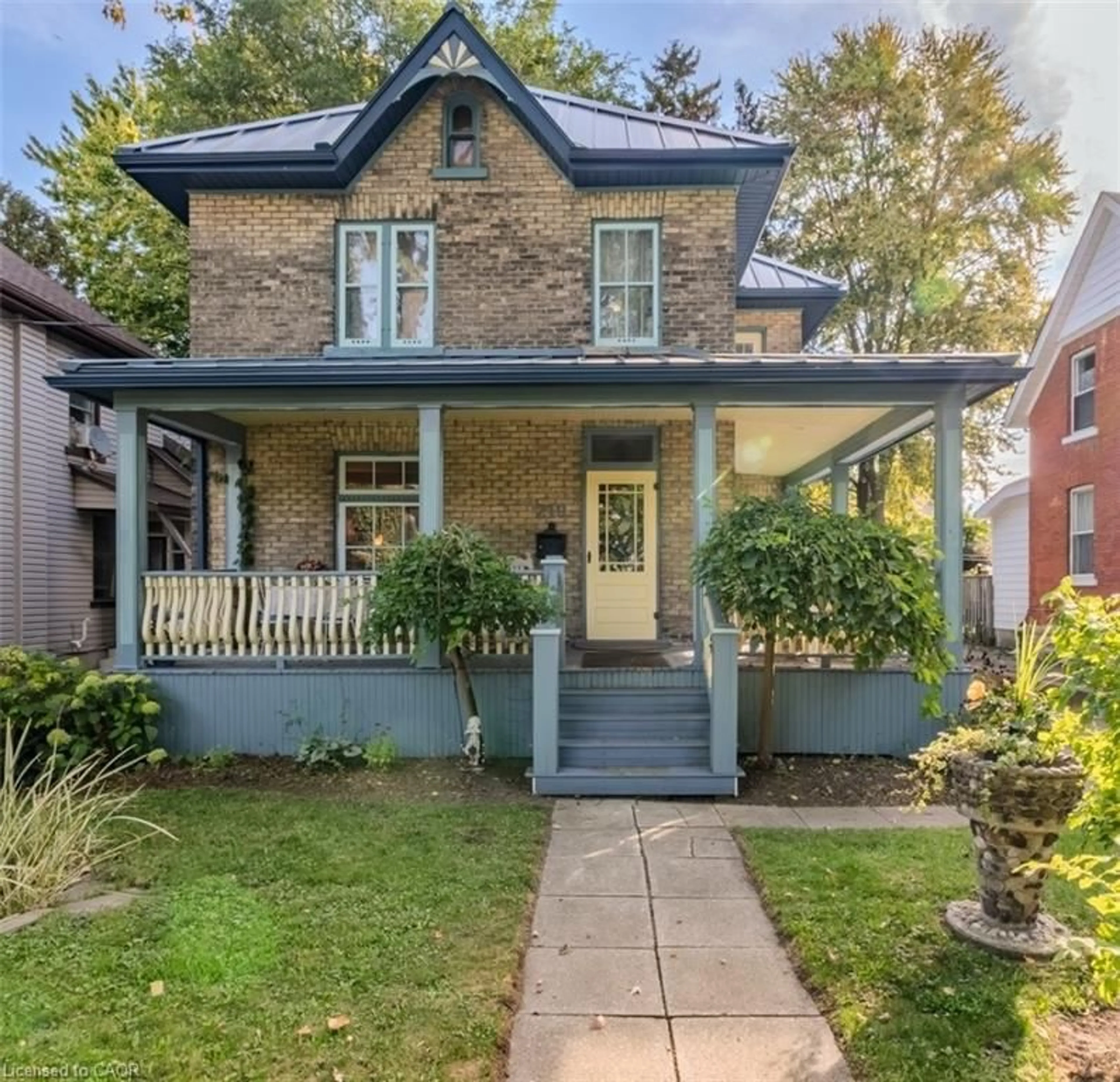 Home with brick exterior material, street for 219 Front St, Stratford Ontario N5A 4H8