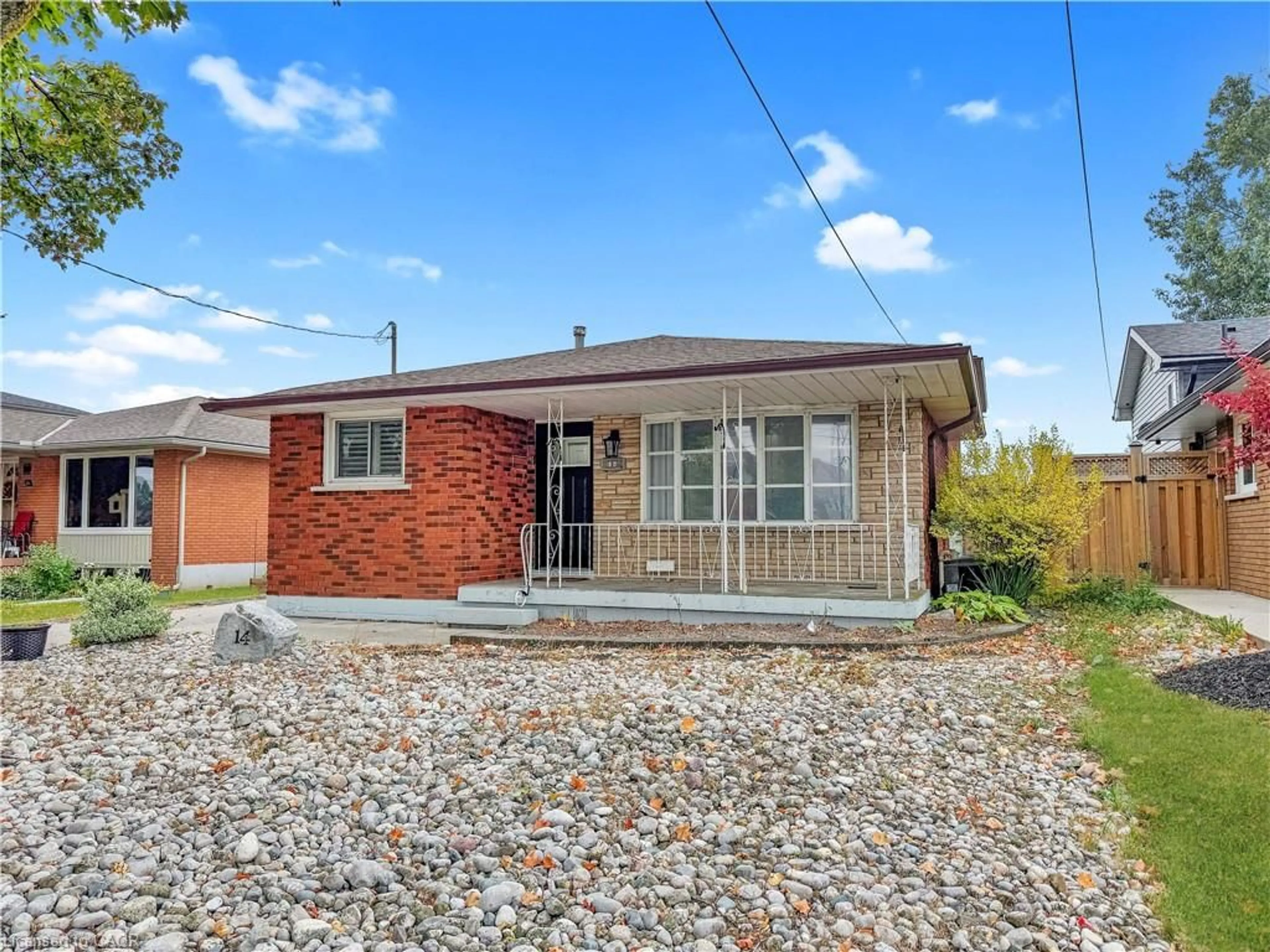 Home with brick exterior material, street for 14 Anson Ave, Hamilton Ontario L8T 2X3