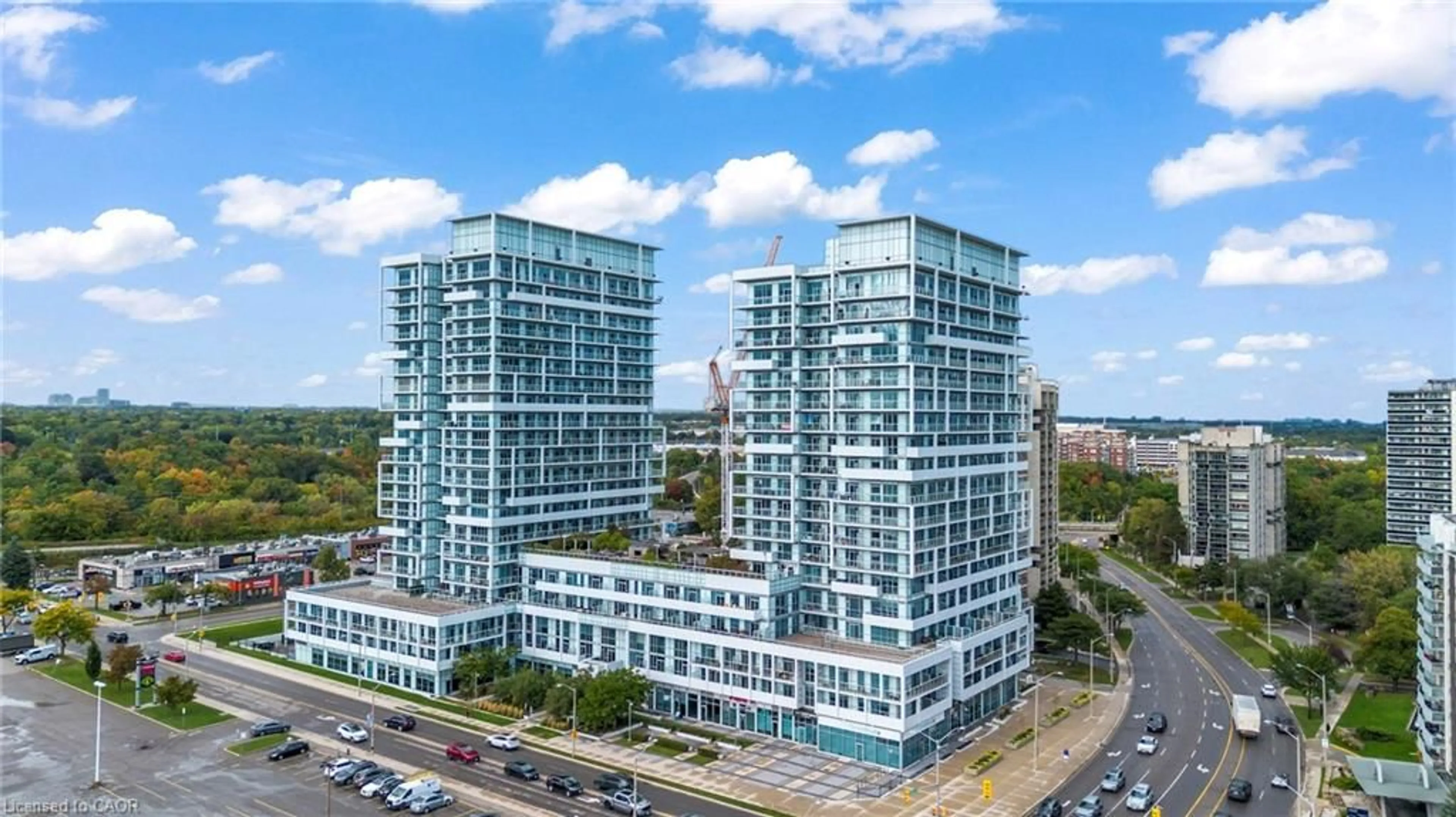 A pic from outside/outdoor area/front of a property/back of a property/a pic from drone, city buildings view from balcony for 55 Speers Rd #1008, Oakville Ontario L6K 0H9