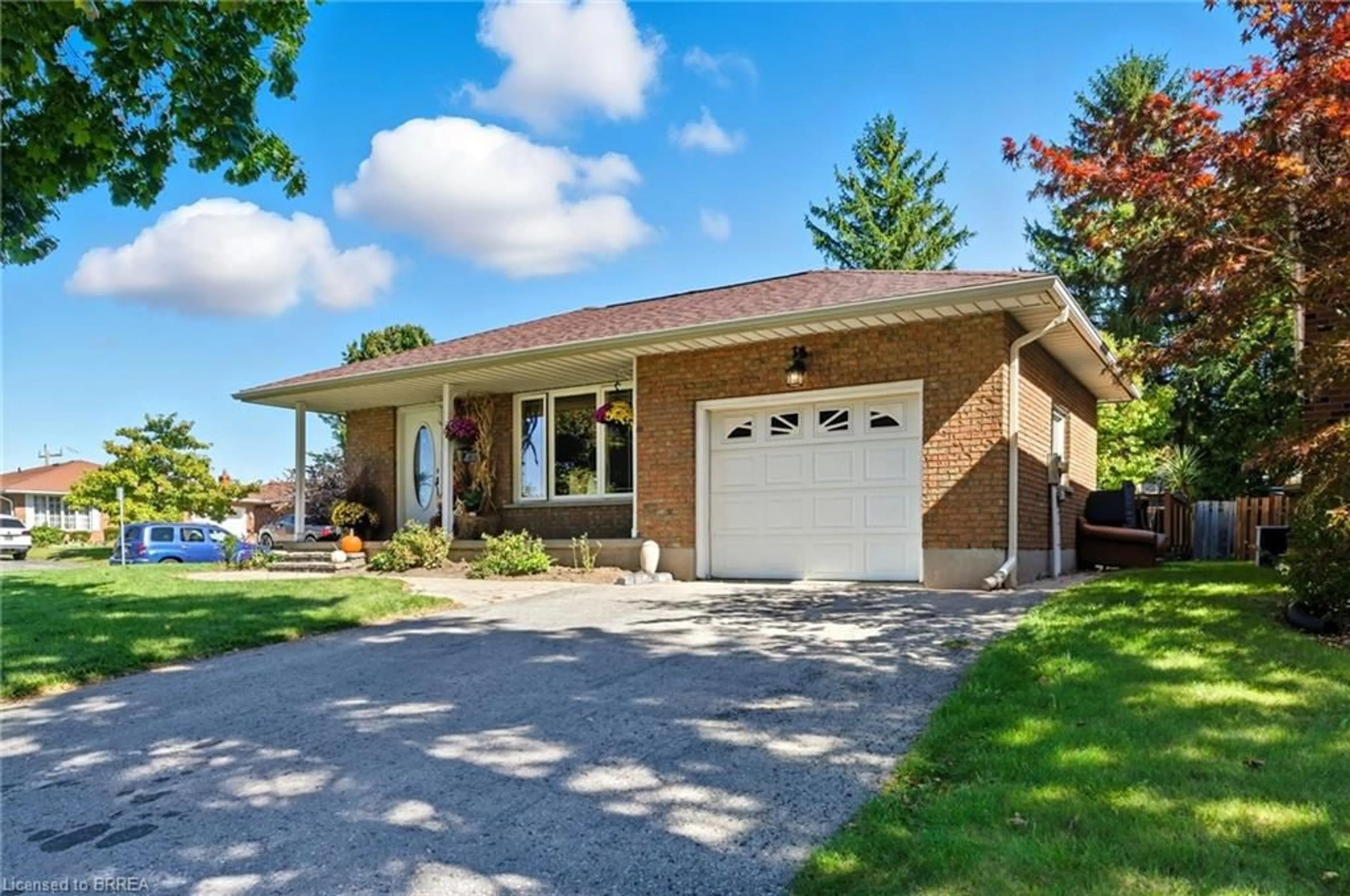 Home with brick exterior material, street for 39 Carriage Rd, Simcoe Ontario N3Y 4Y3