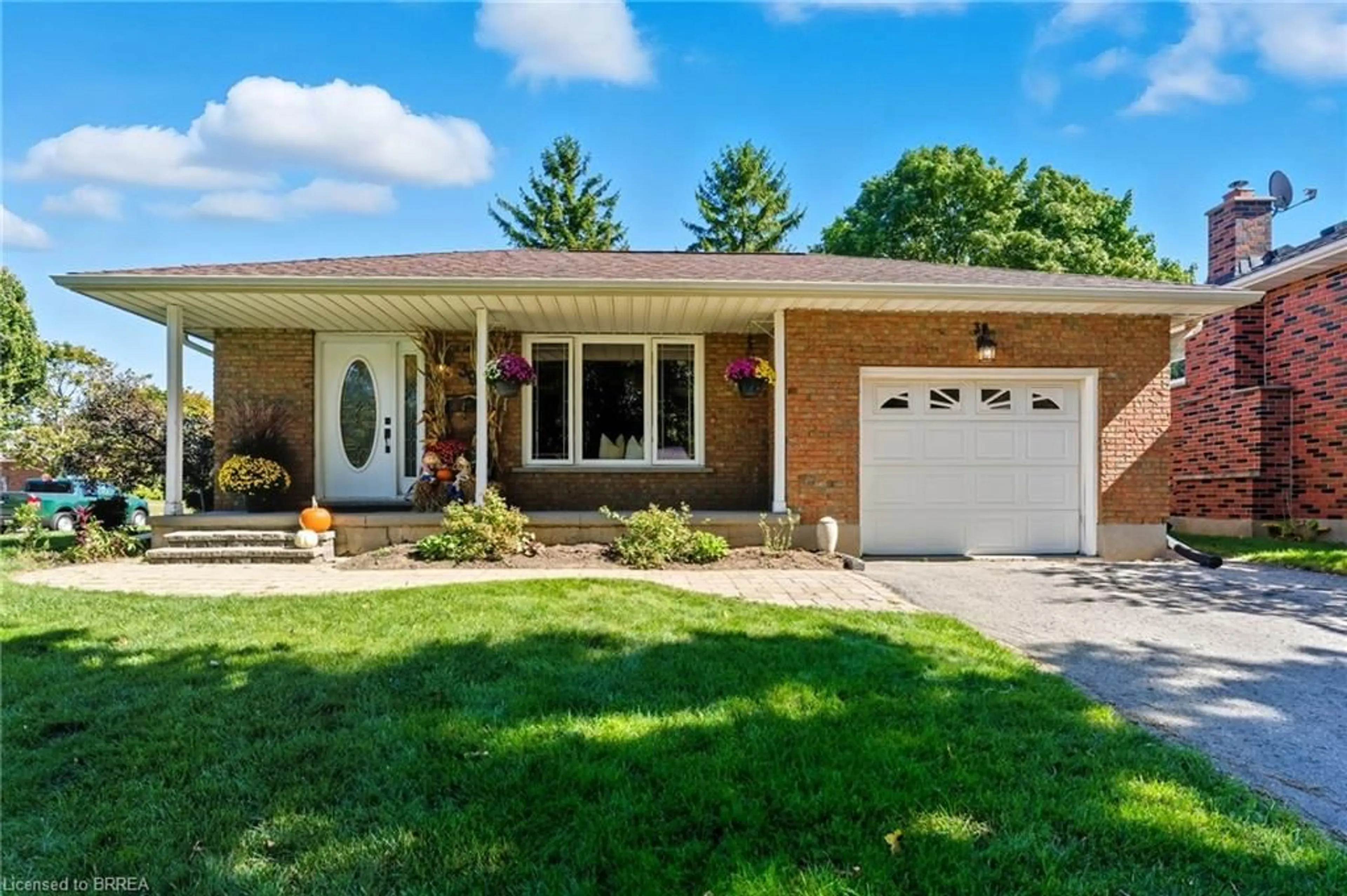 Home with brick exterior material, street for 39 Carriage Rd, Simcoe Ontario N3Y 4Y3