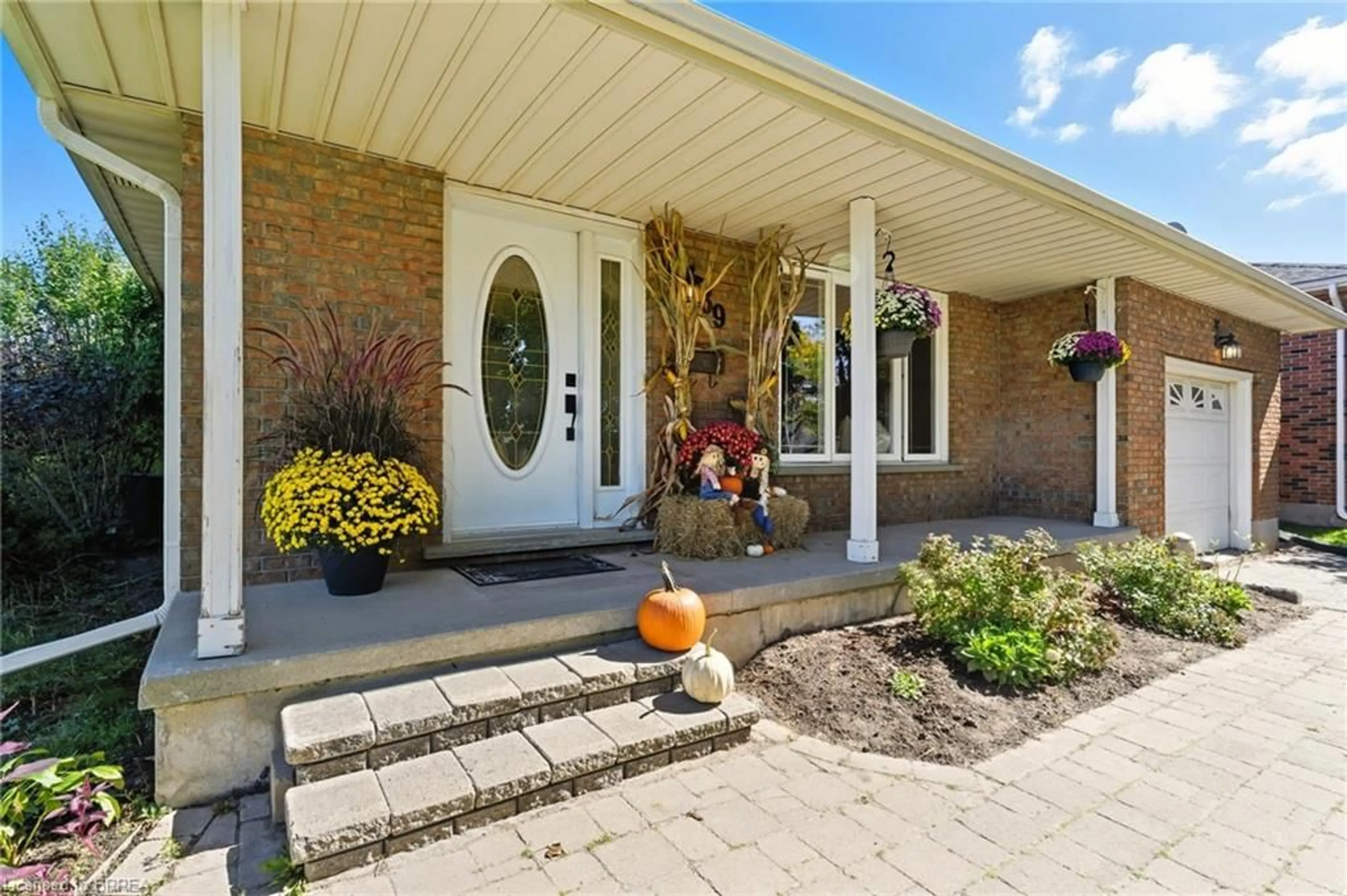 Home with brick exterior material, street for 39 Carriage Rd, Simcoe Ontario N3Y 4Y3