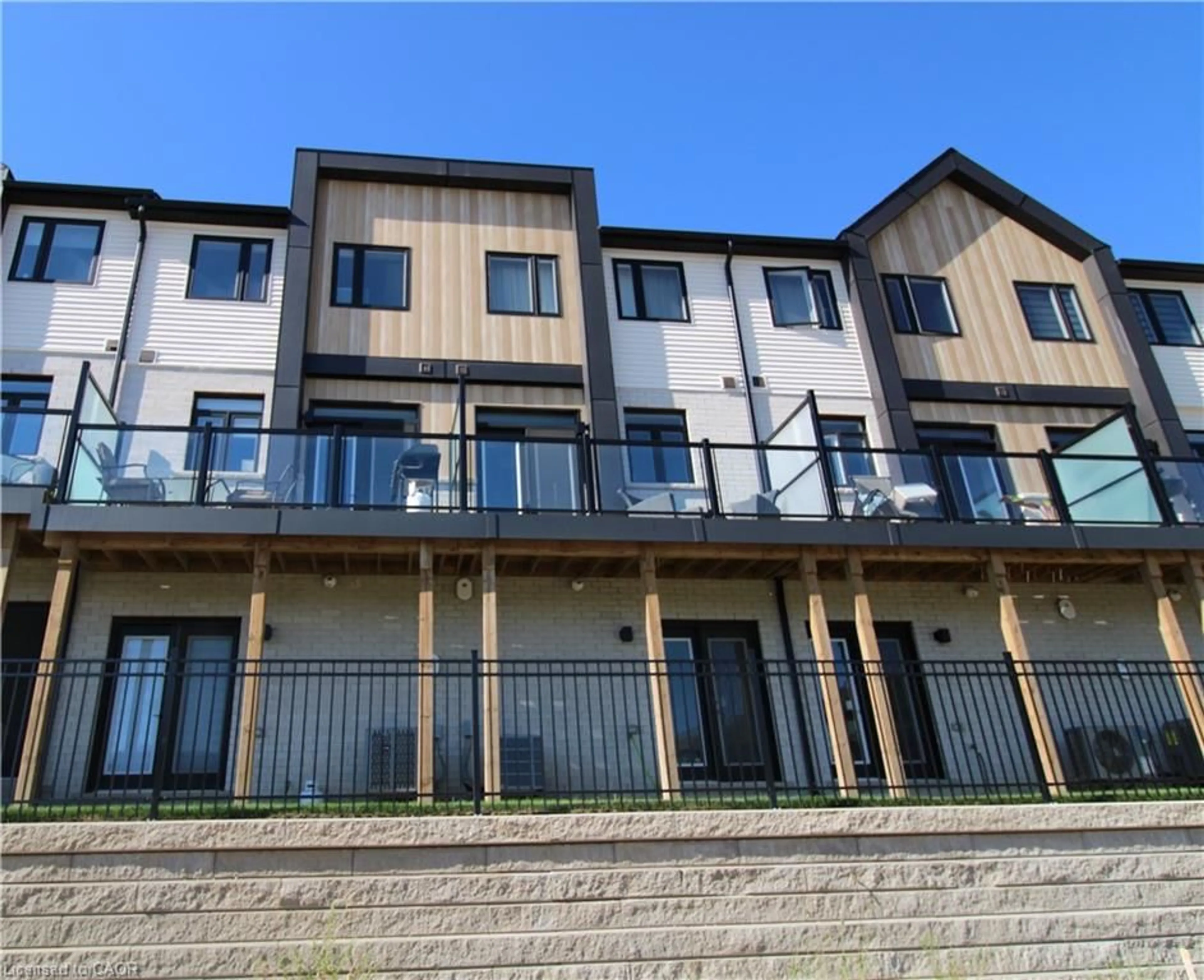 A pic from outside/outdoor area/front of a property/back of a property/a pic from drone, building for 55 Tom Brown Dr #91, Paris Ontario N3L 0K6