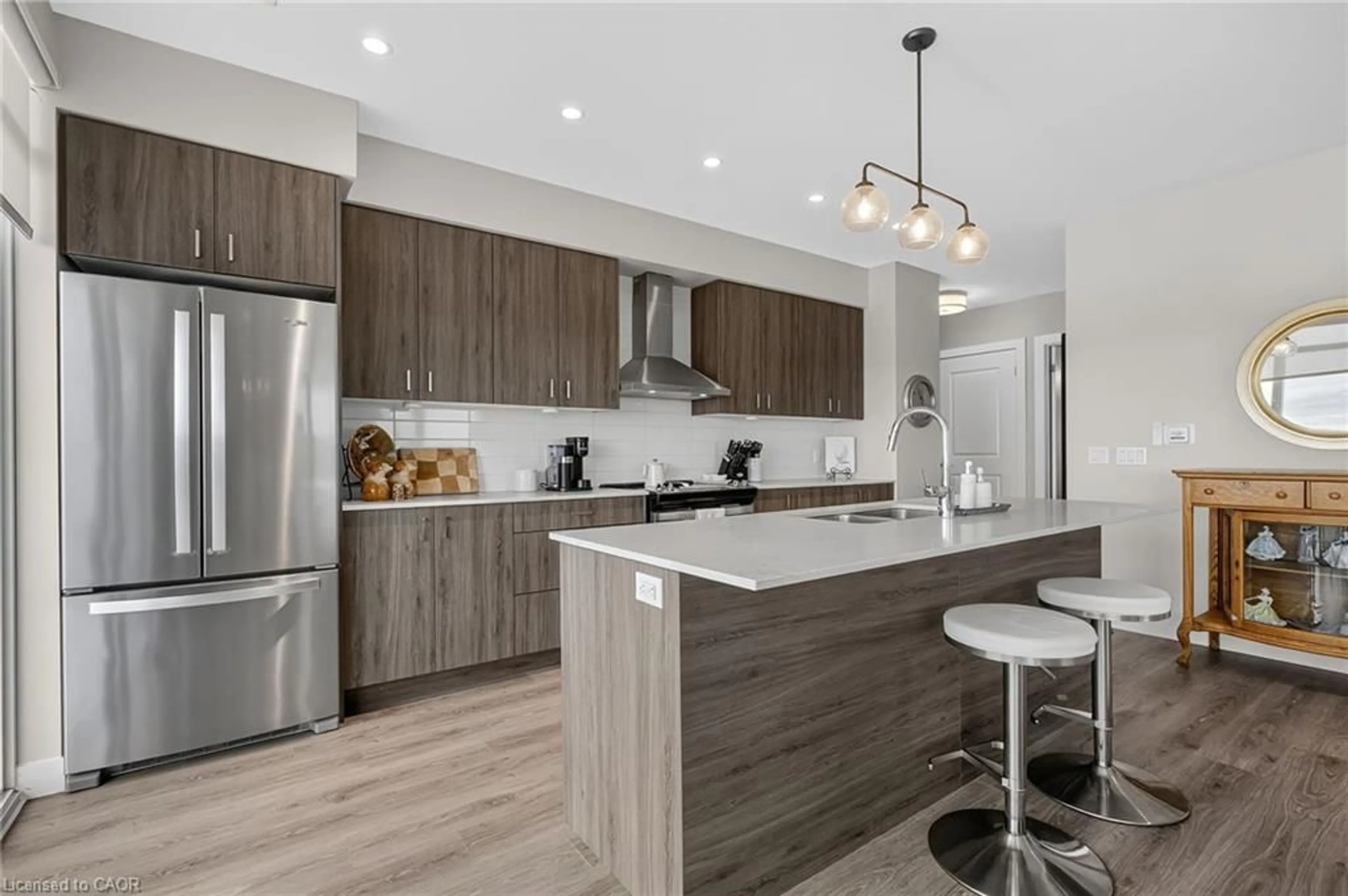 Open concept kitchen, wood/laminate floor for 15 Glebe St #1313, Cambridge Ontario N1S 0C3