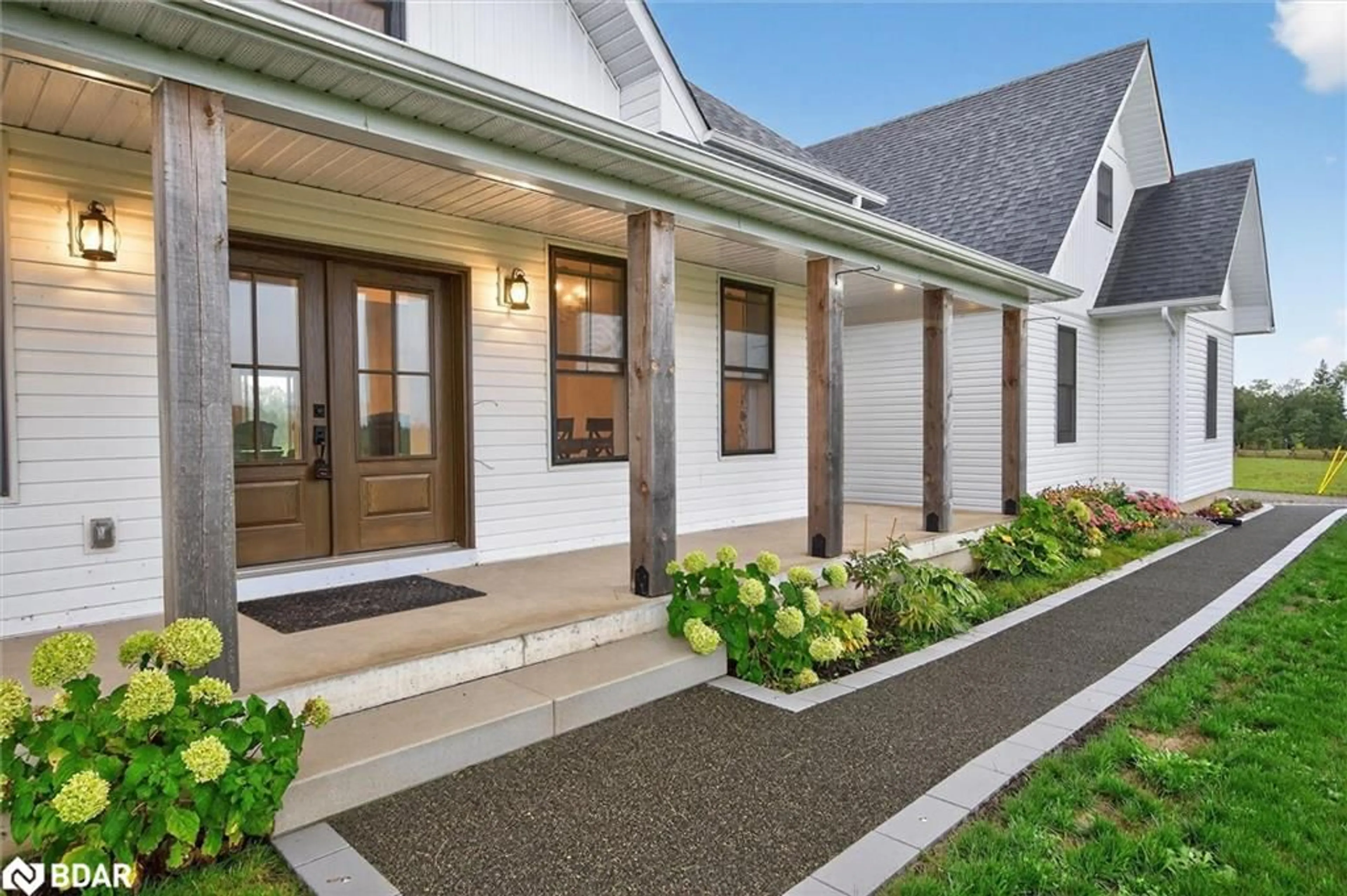 Home with vinyl exterior material, street for 613 County 8 Rd, Douro-Dummer Ontario K0L 2B0
