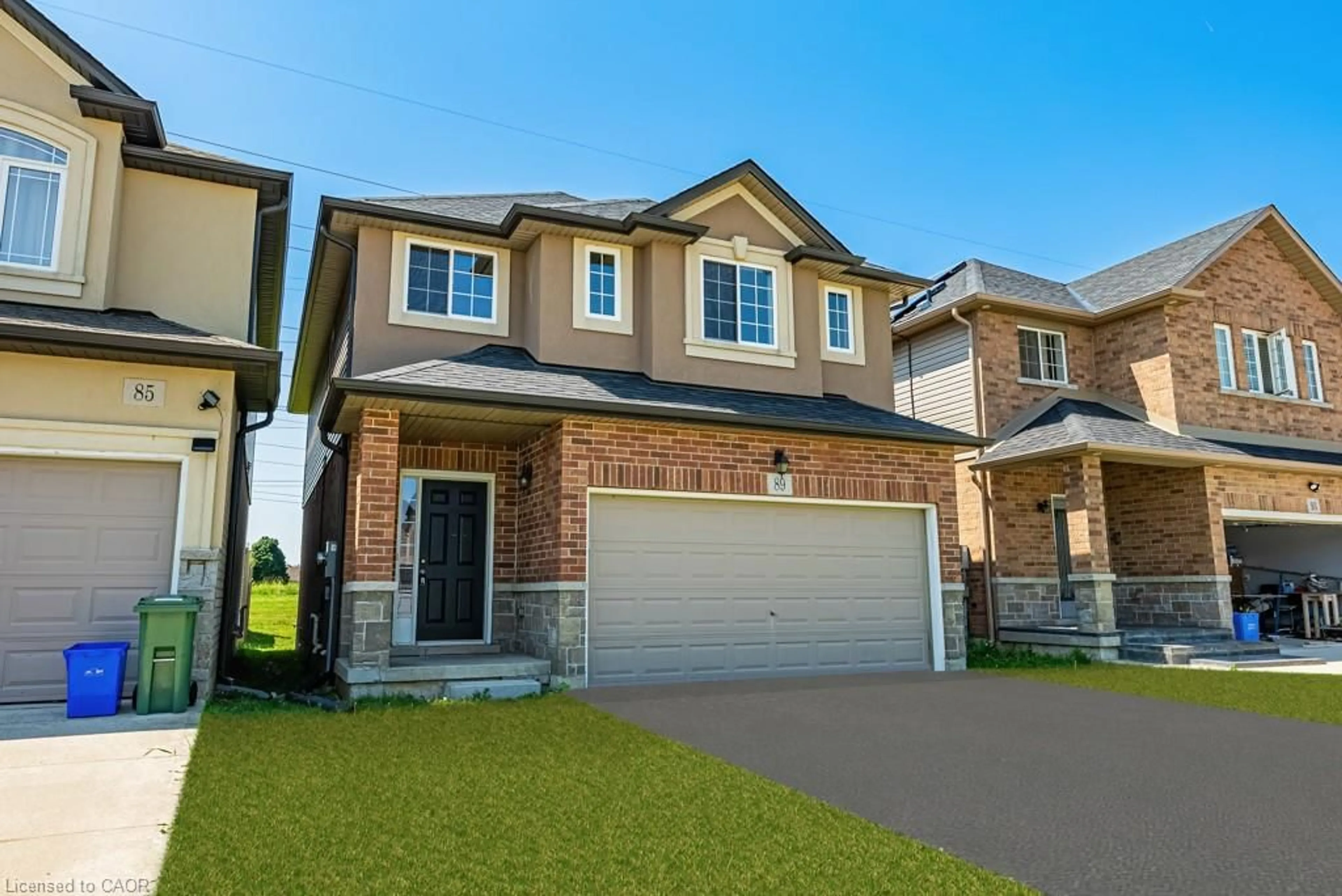 Home with brick exterior material, street for 89 Medici Lane, Hamilton Ontario L9B 0G8