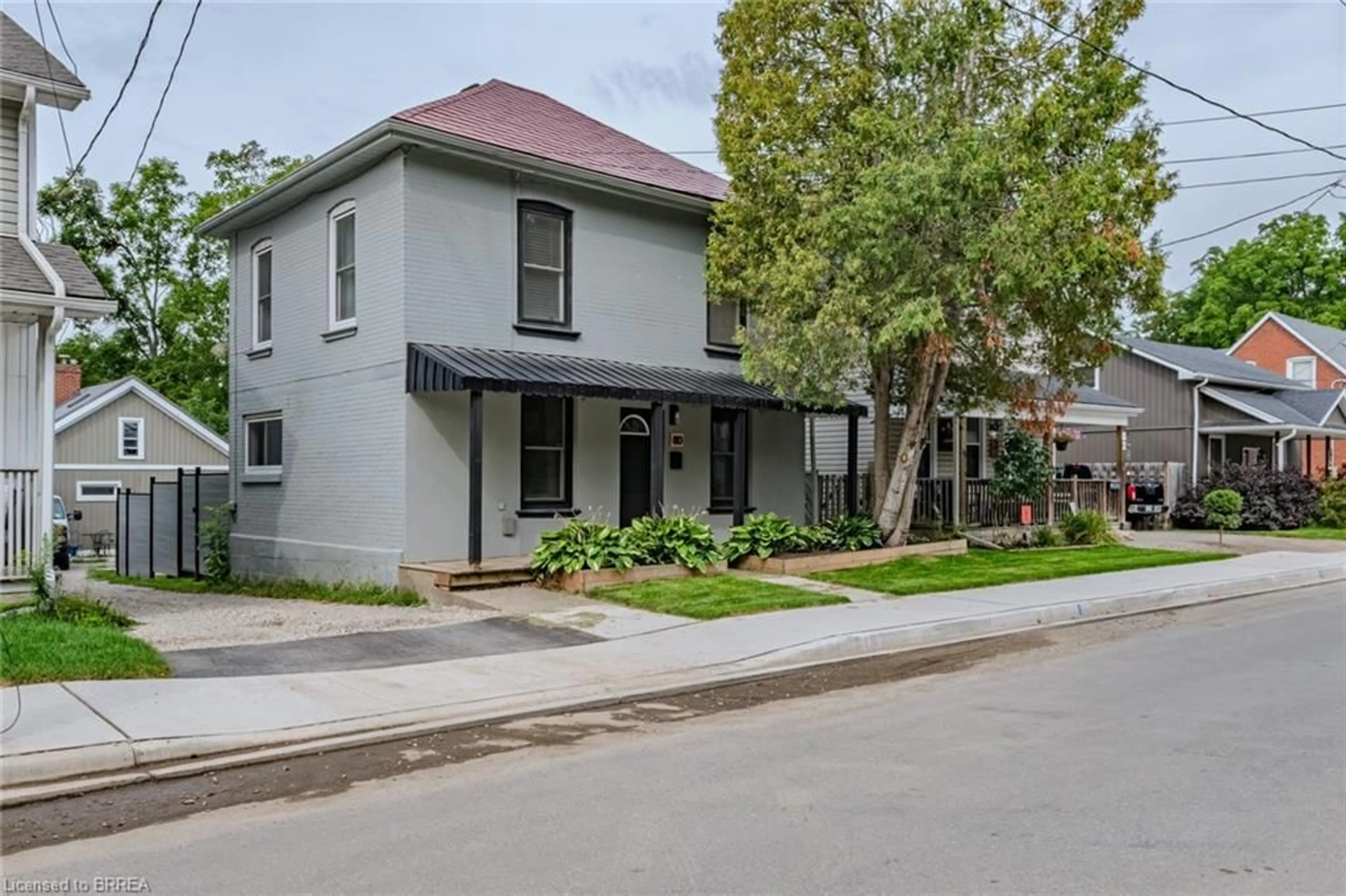 Home with brick exterior material, street for 80 West River St, Paris Ontario N3L 2V1