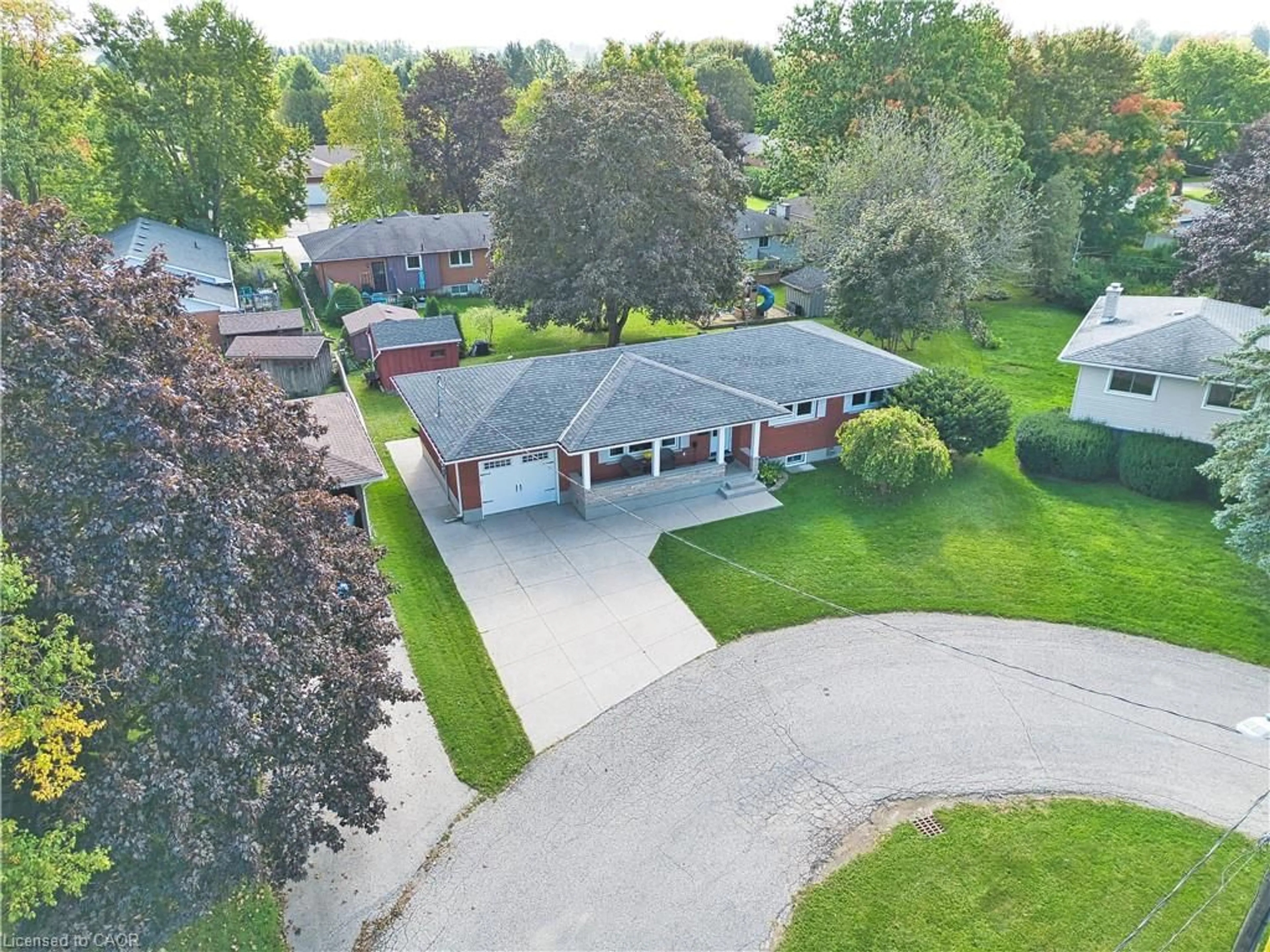 A pic from outside/outdoor area/front of a property/back of a property/a pic from drone, street for 5 Tatham Pl, Listowel Ontario N4W 3C2
