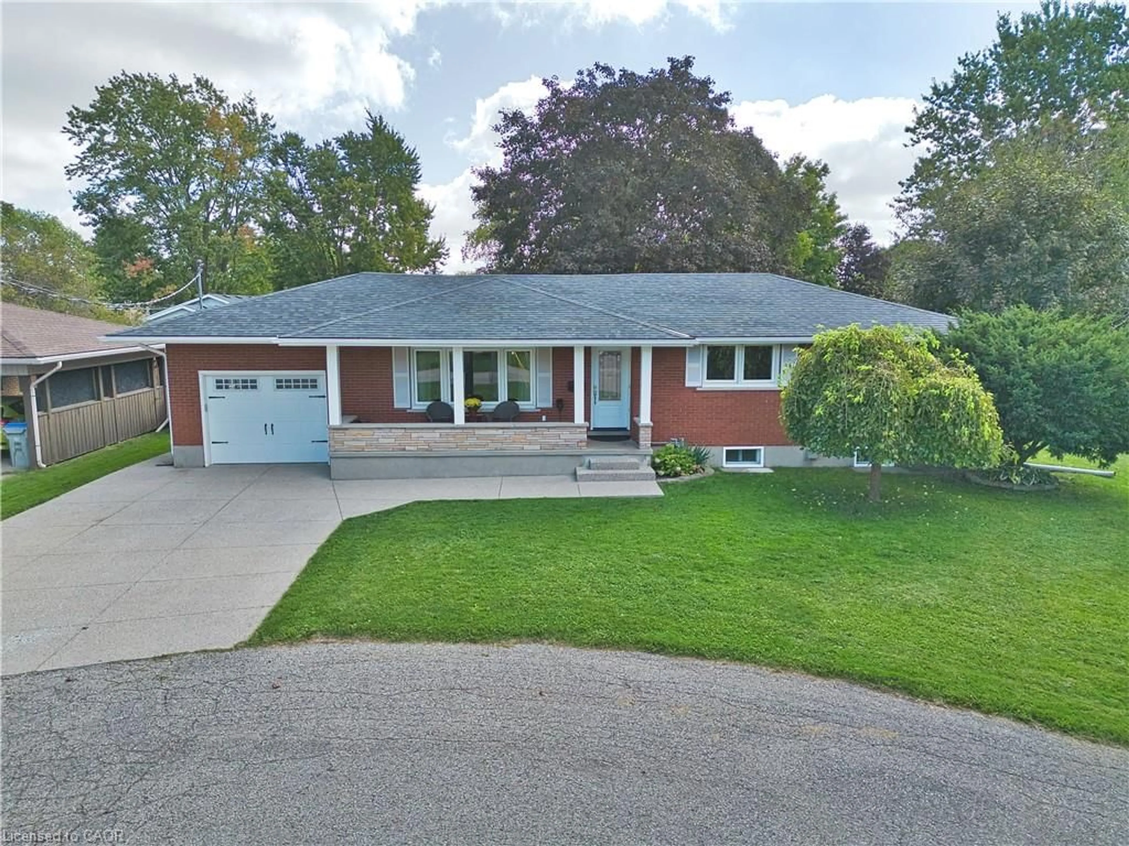 Home with brick exterior material, street for 5 Tatham Pl, Listowel Ontario N4W 3C2