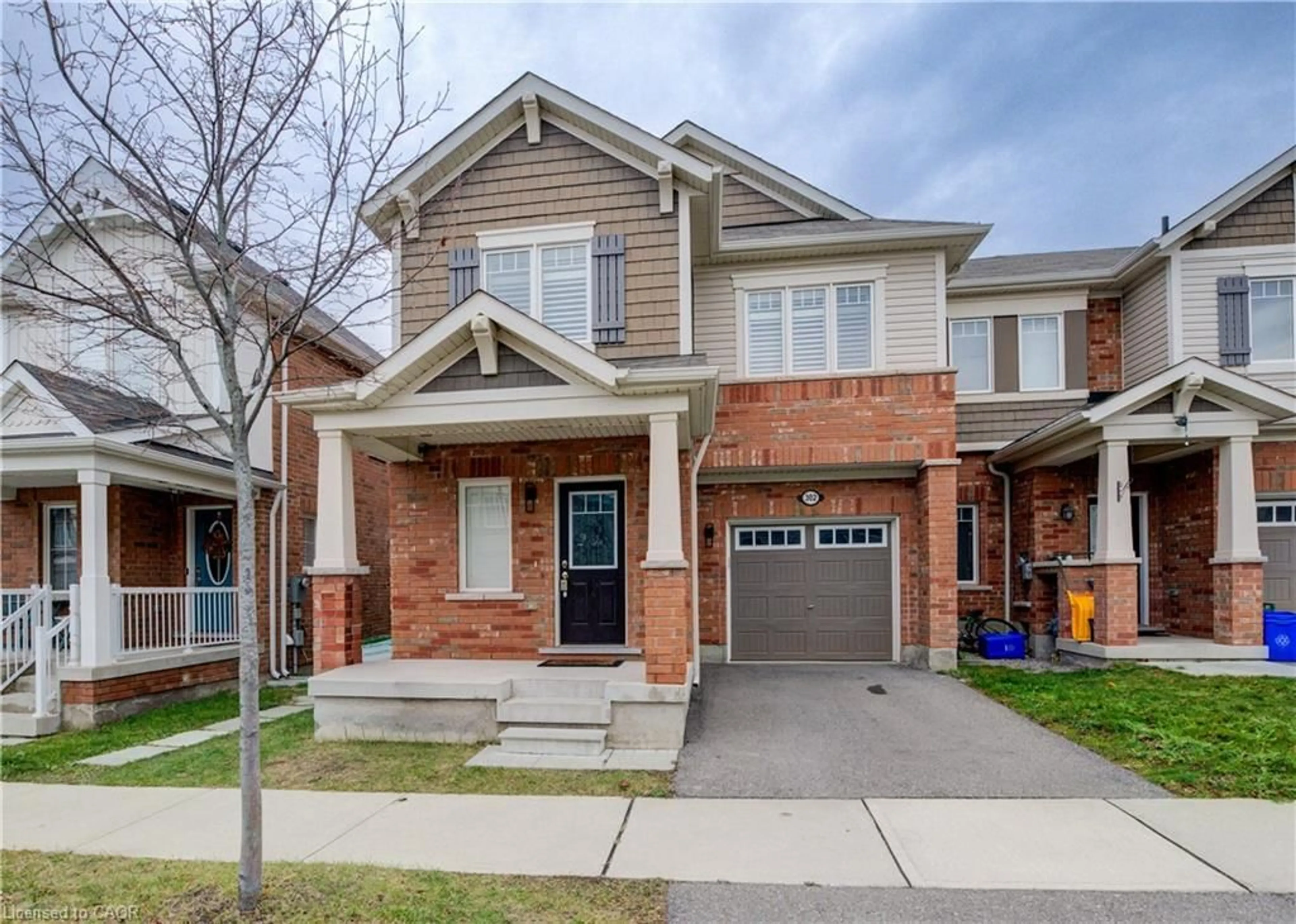 Home with brick exterior material, street for 302 Jean Landng, Milton Ontario L9E 1C6