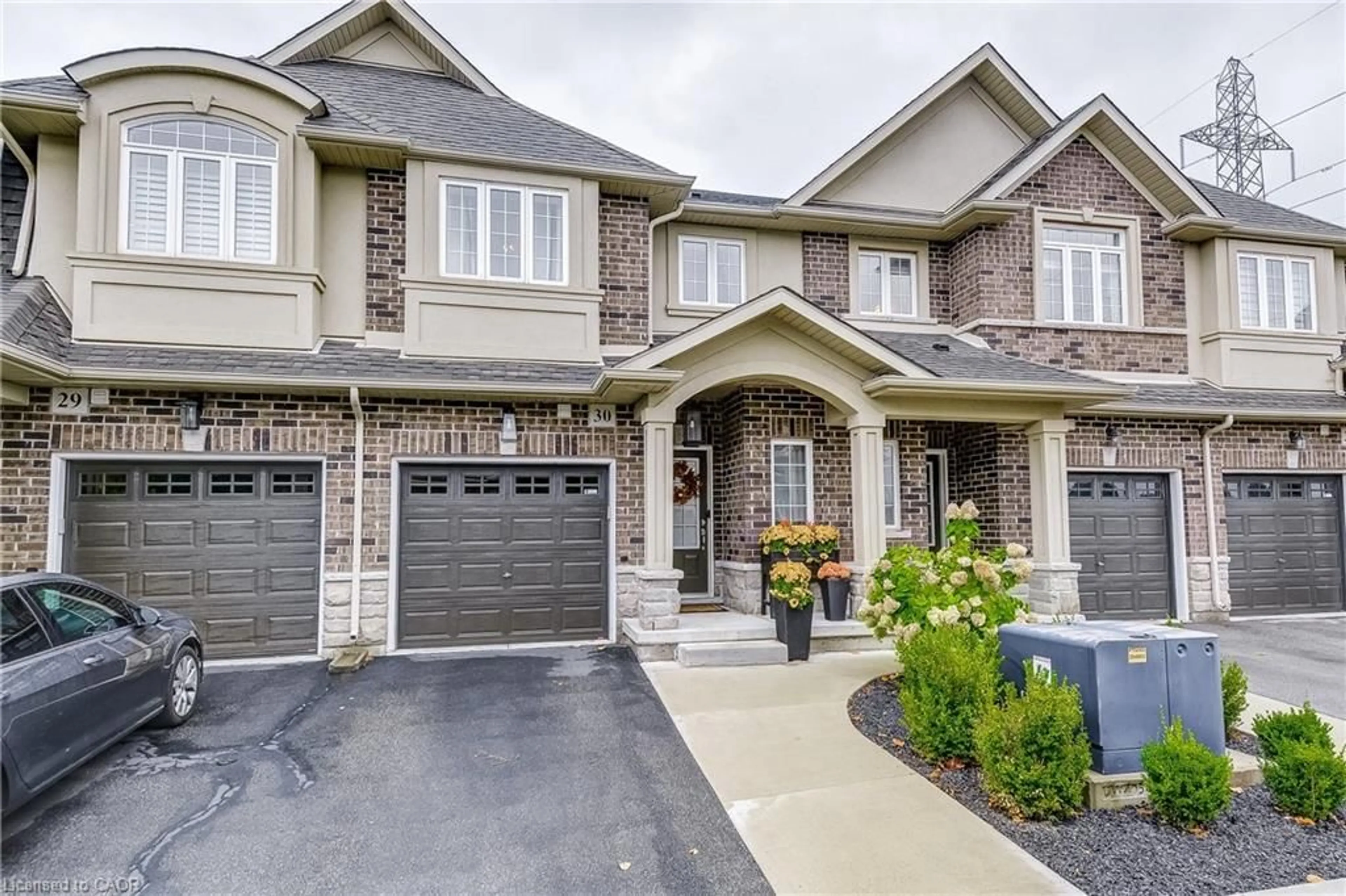 Home with brick exterior material, street for 21 Madonna Dr #30, Hamilton Ontario L9B 0H1