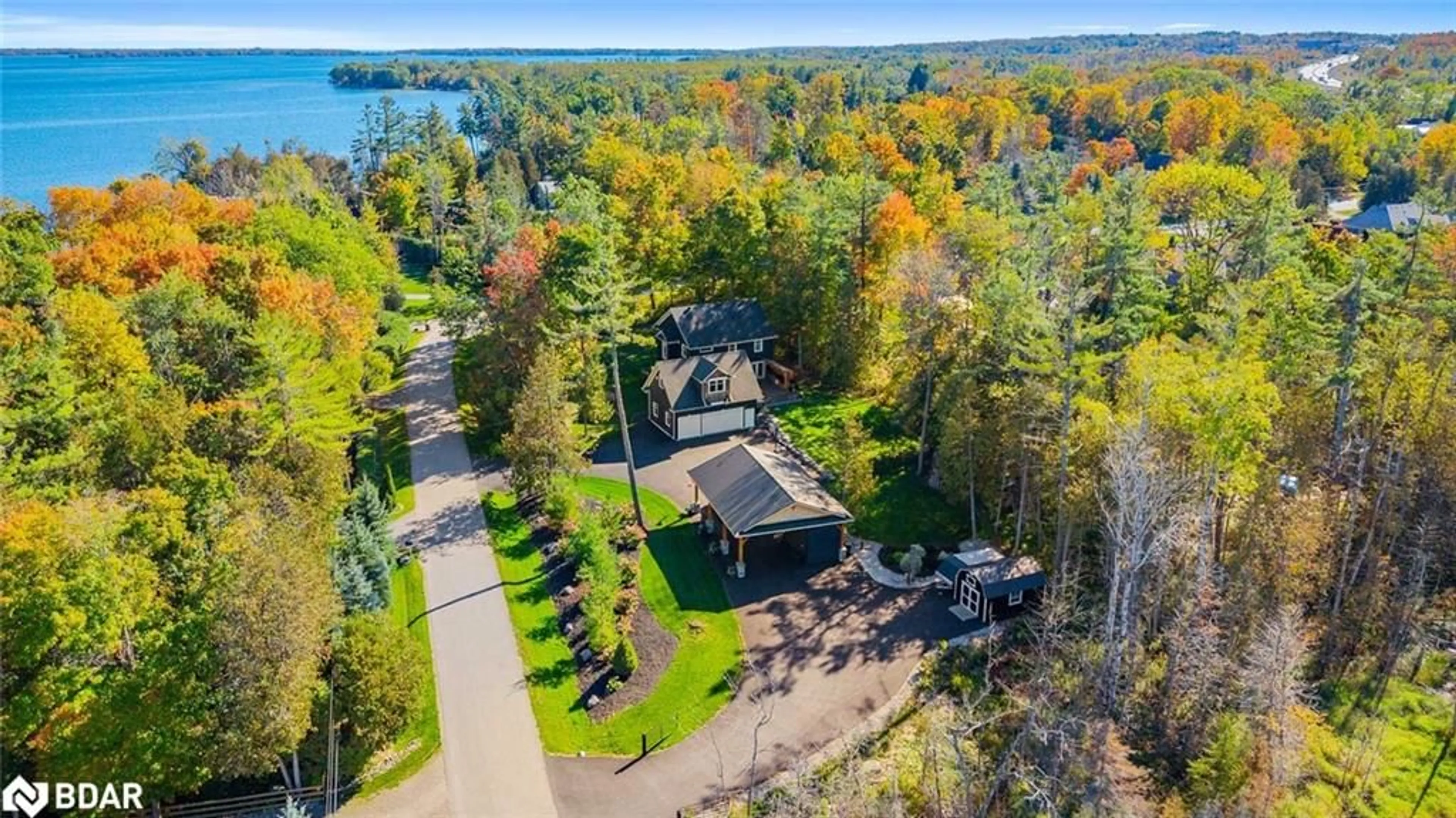 A pic from outside/outdoor area/front of a property/back of a property/a pic from drone, water/lake/river/ocean view for 4146 Forest Wood Dr, Severn Ontario L3V 6H3