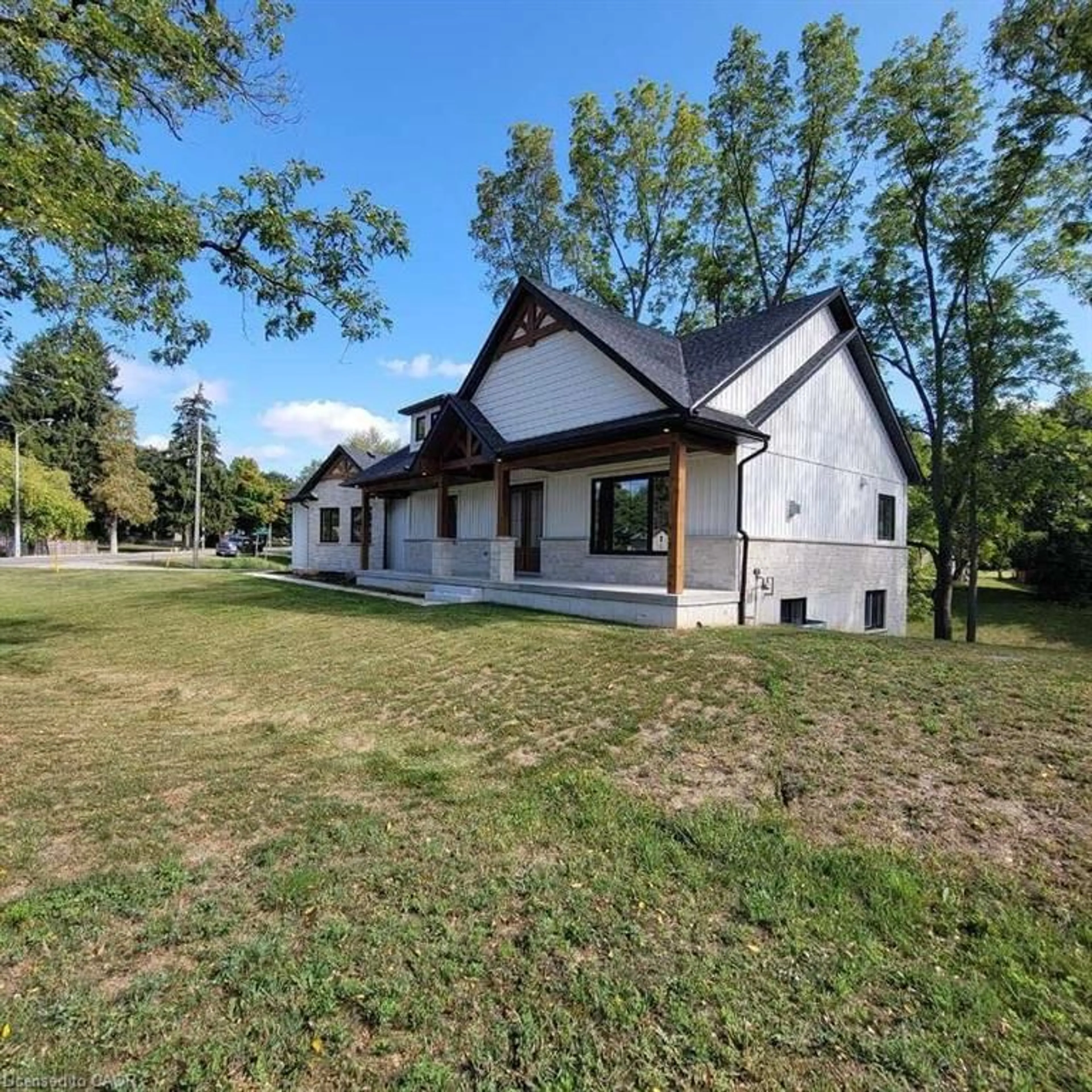 A pic from outside/outdoor area/front of a property/back of a property/a pic from drone, unknown for 66 Talbot St, Courtland Ontario N0J 1E0