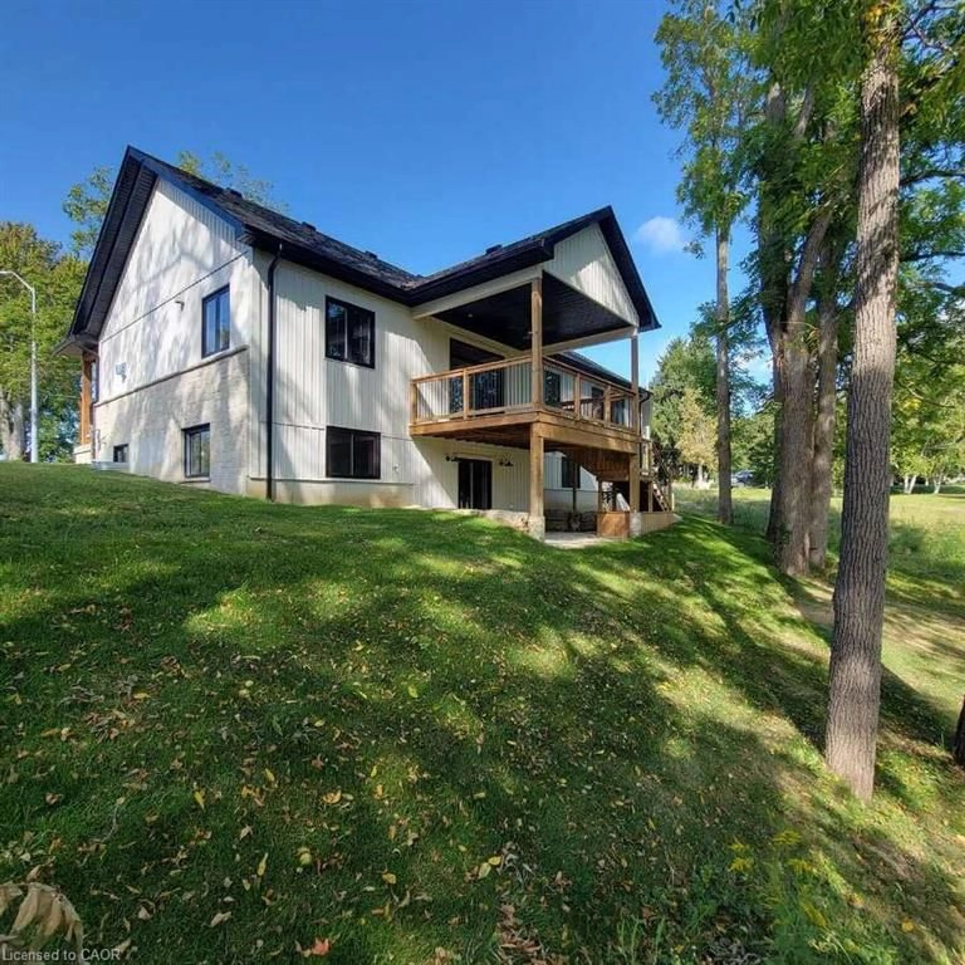 A pic from outside/outdoor area/front of a property/back of a property/a pic from drone, water/lake/river/ocean view for 66 Talbot St, Courtland Ontario N0J 1E0