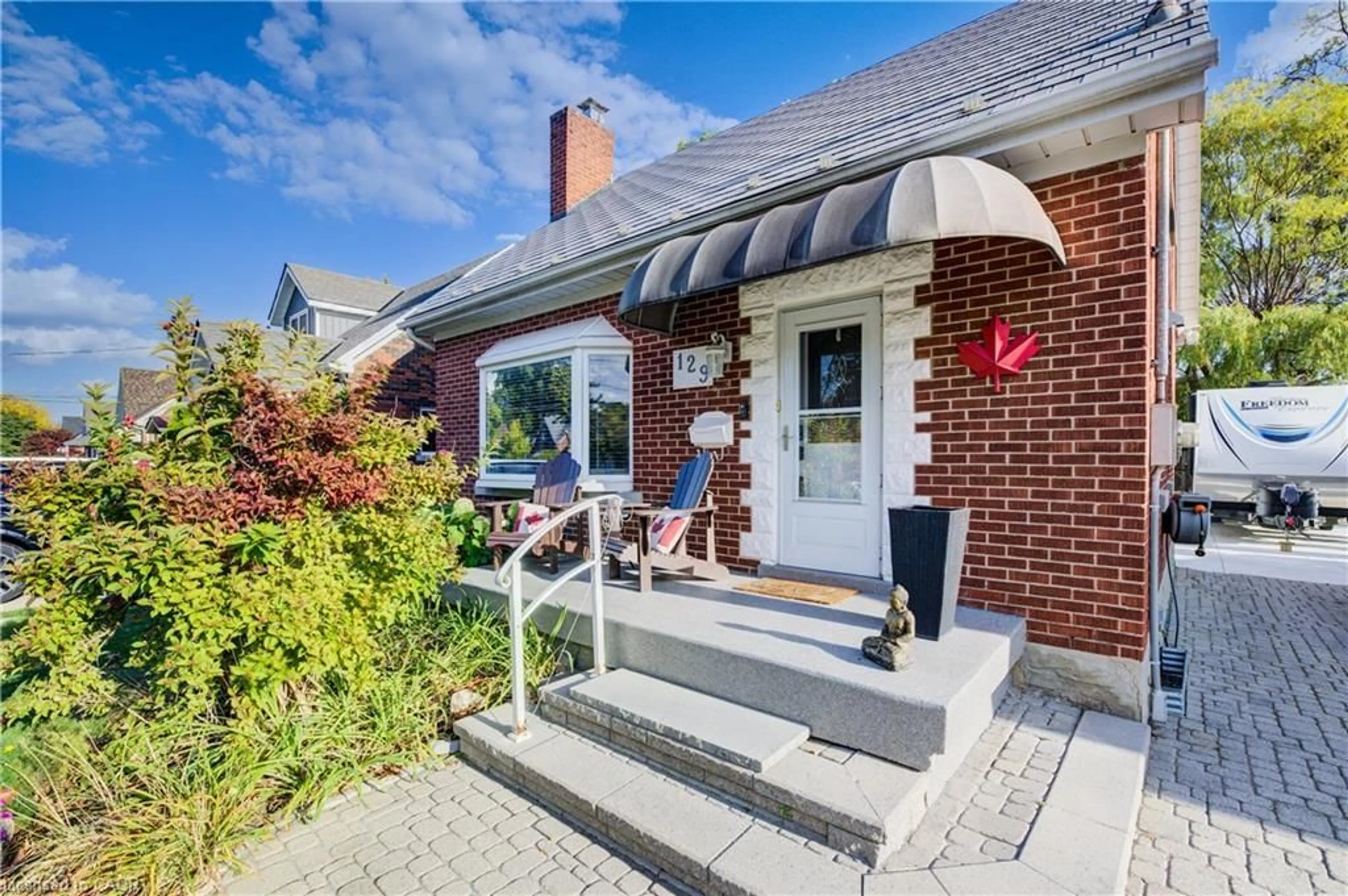 Home with brick exterior material, street for 129 Talbot St, Kitchener Ontario N2M 2B2