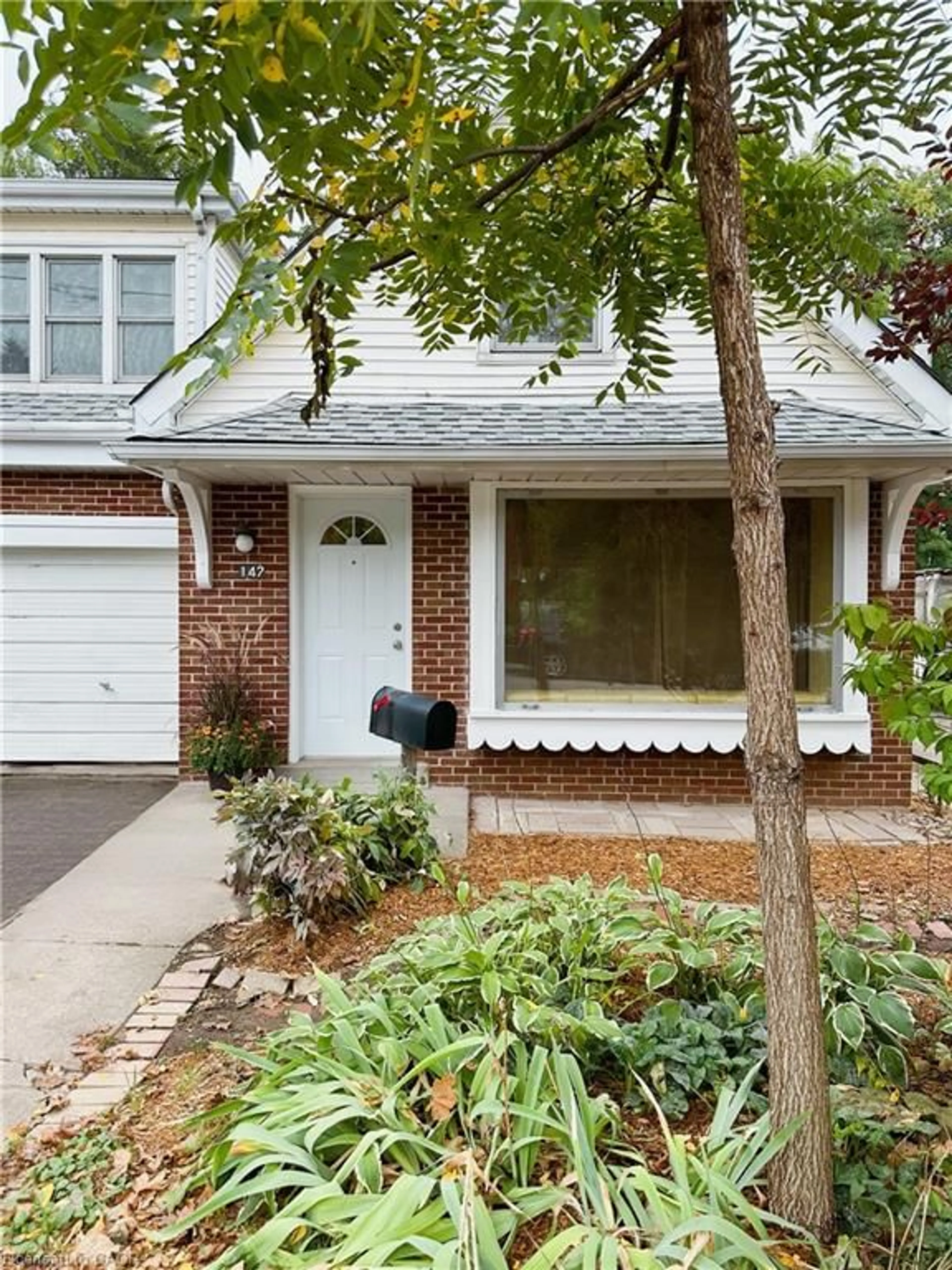 Home with brick exterior material, street for 147 Cline Ave, Hamilton Ontario L8S 1X3