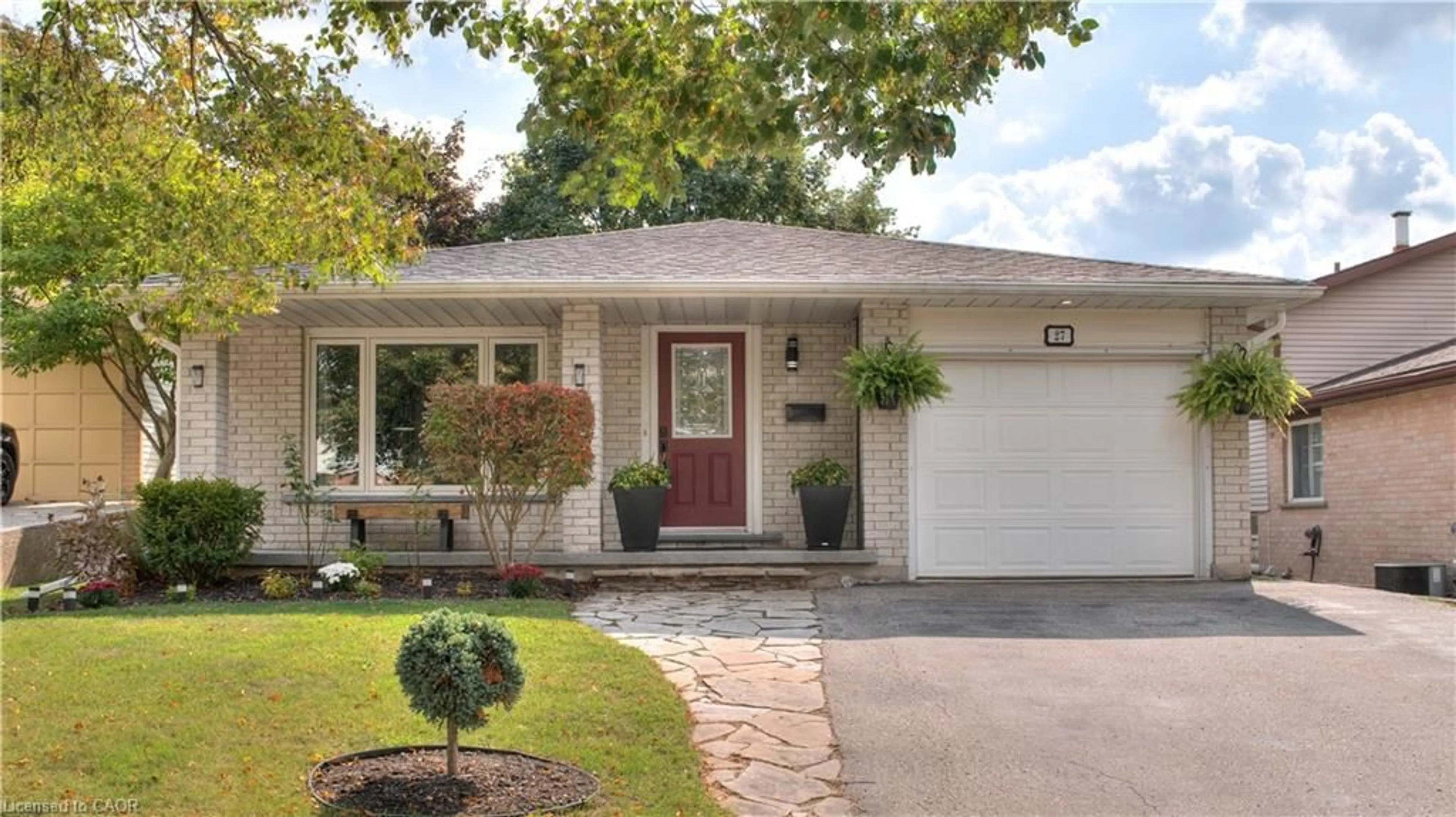 Home with brick exterior material, street for 27 Wheatfield Cres, Kitchener Ontario N2P 1P7
