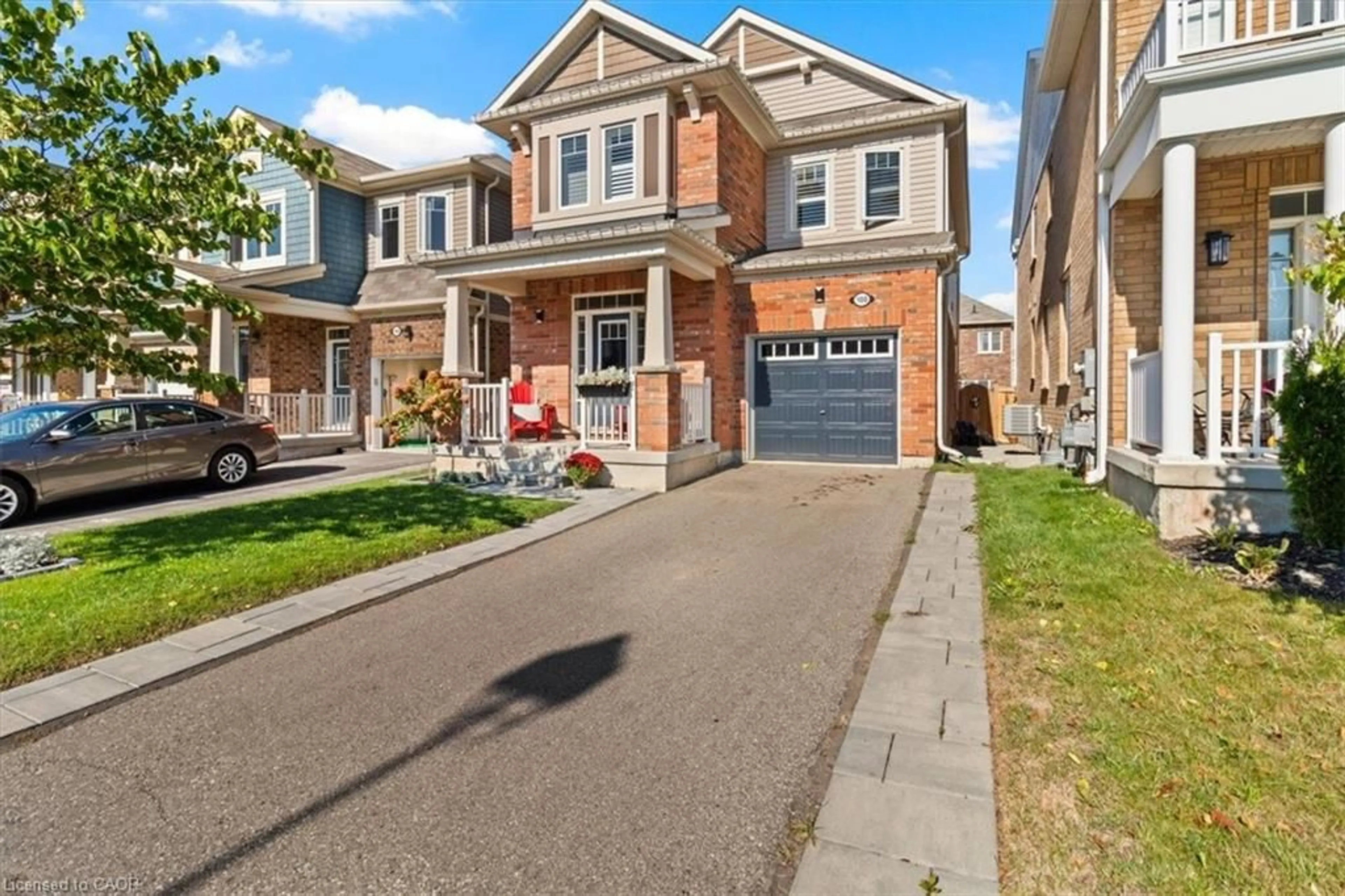 Home with brick exterior material, street for 100 Celano Dr, Waterdown Ontario L8B 1V2