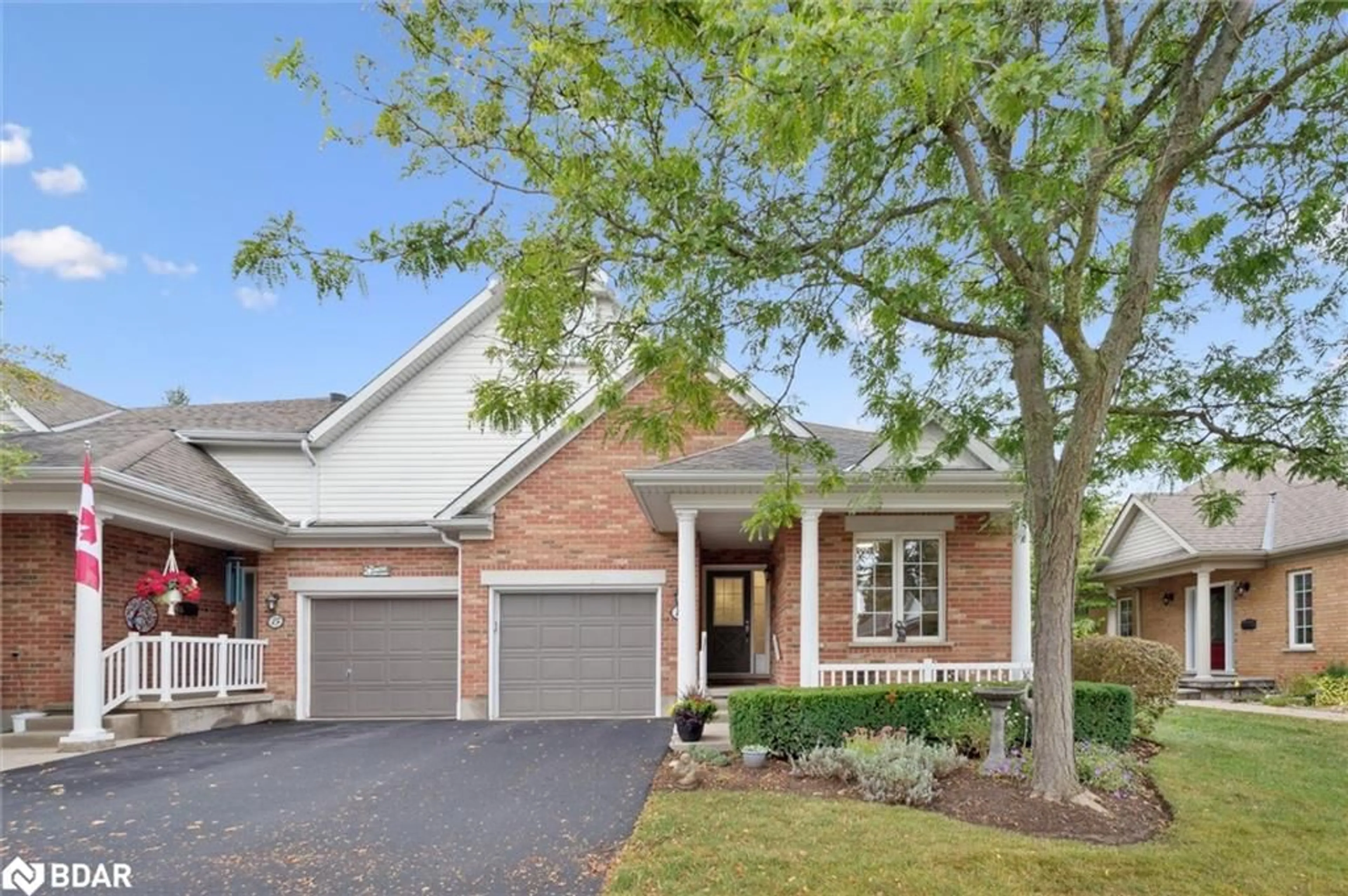 Home with brick exterior material, street for 11 Magnolia Lane, Guelph Ontario N1G 4X7