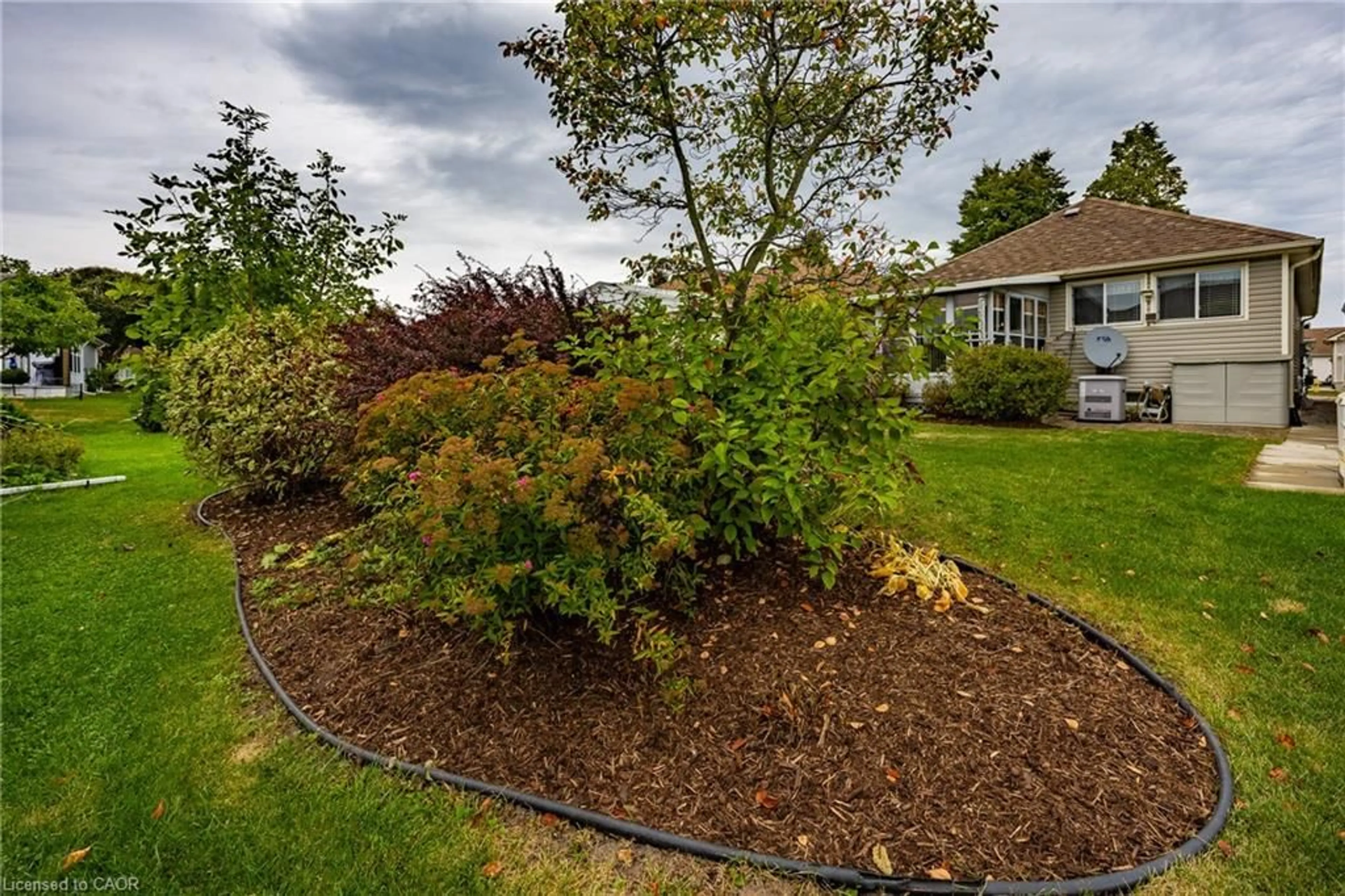 A pic from outside/outdoor area/front of a property/back of a property/a pic from drone, street for 4 Walsingham Dr, Port Rowan Ontario N0E 1M0