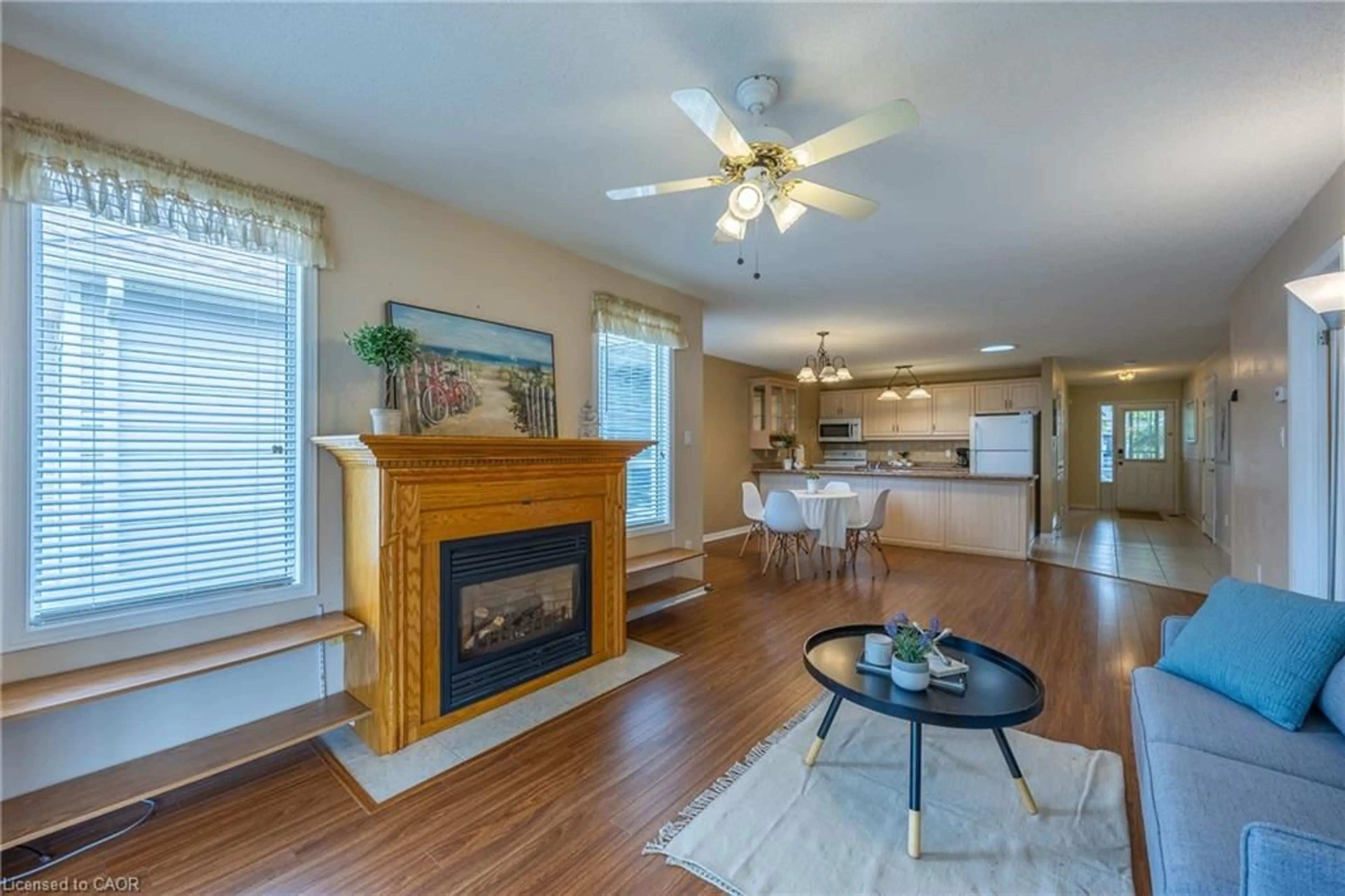 Living room with furniture, wood/laminate floor for 4 Walsingham Dr, Port Rowan Ontario N0E 1M0