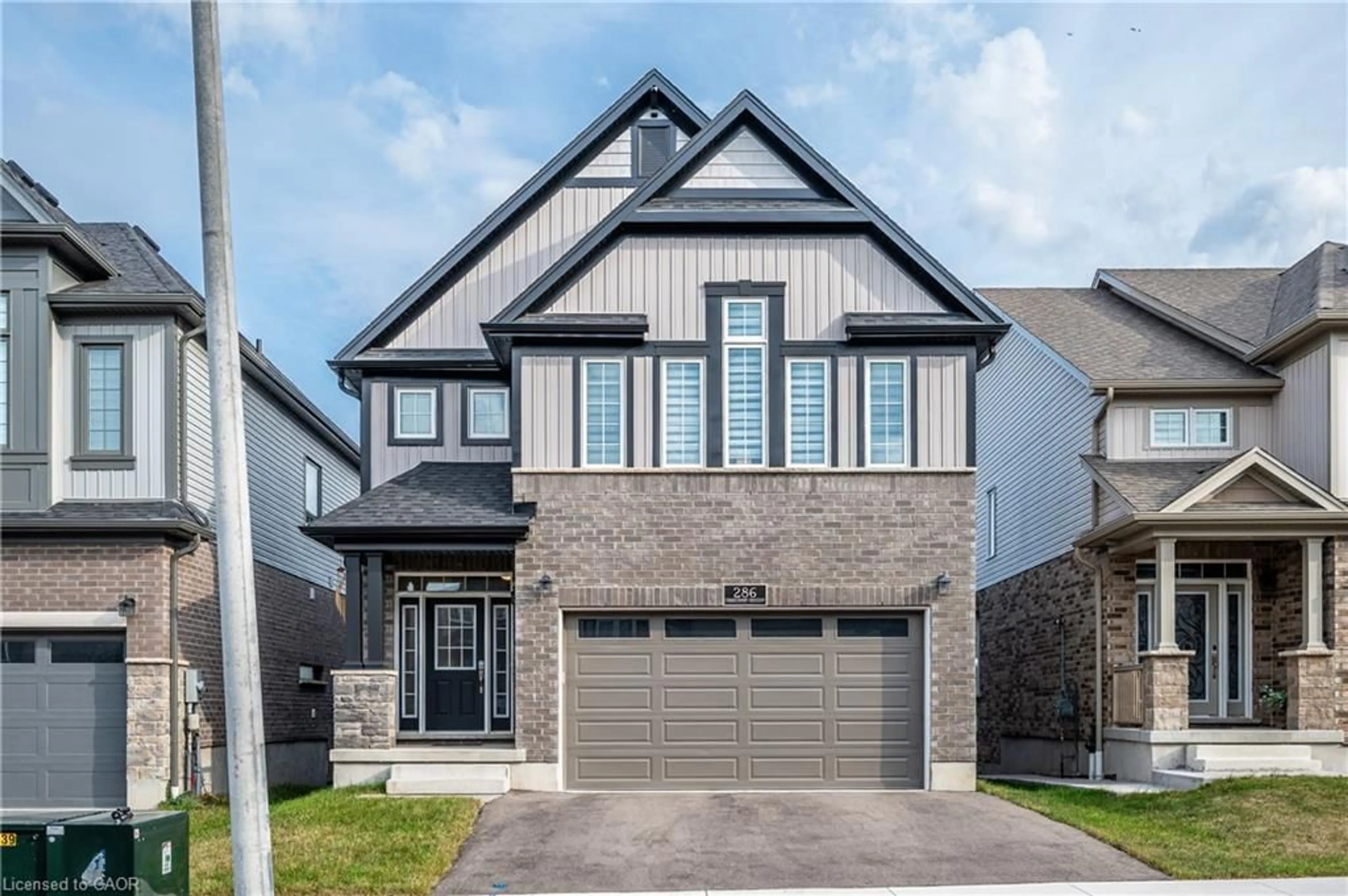 Home with brick exterior material, street for 286 Chokecherry Cres, Waterloo Ontario N2V 0C3